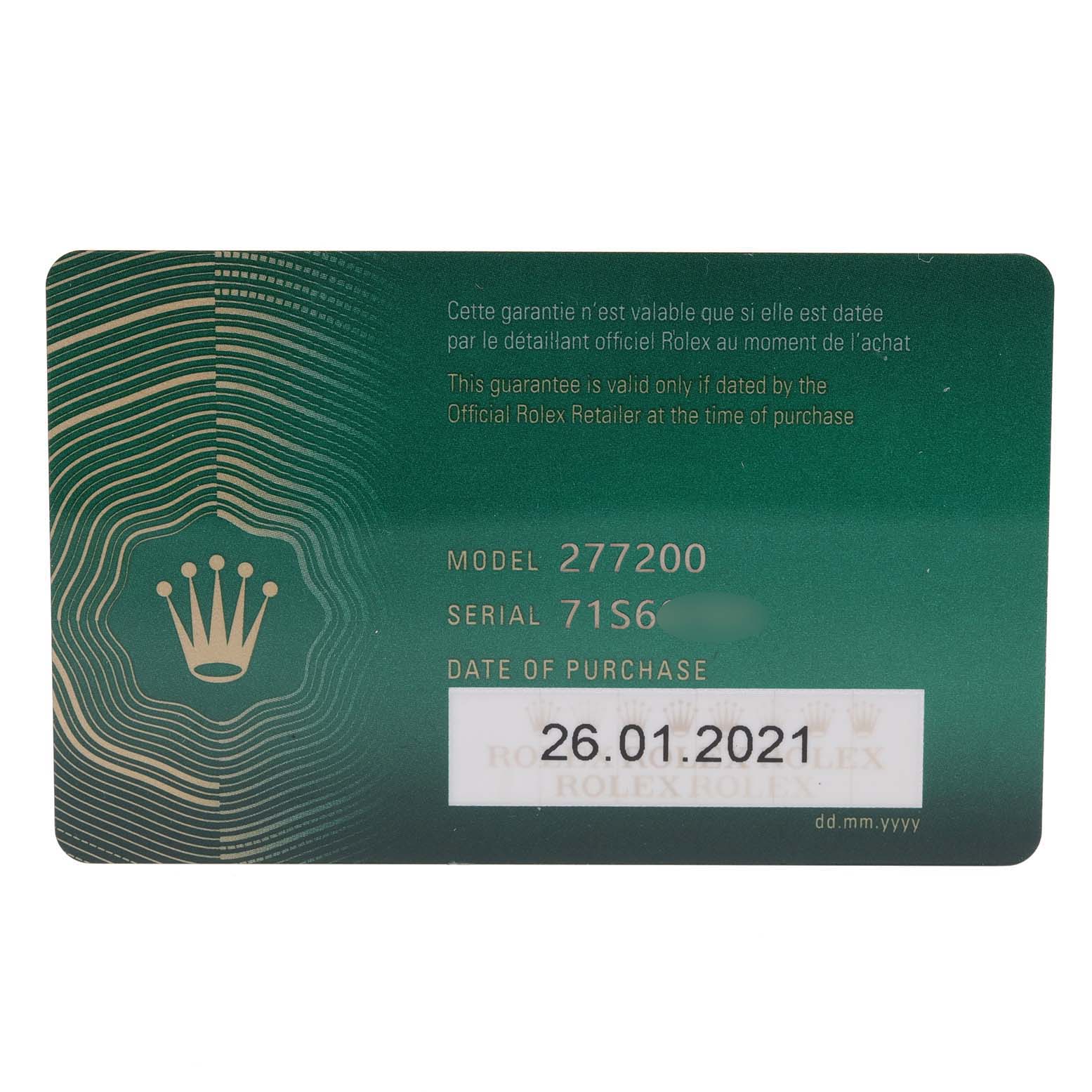 This is the warranty card for the Rolex Mid-Size 277200 Women's Stainless Steel Pink Dial 277200 Women's Stainless Steel Pink Dial model 277200, showing the serial number and date of purchase.