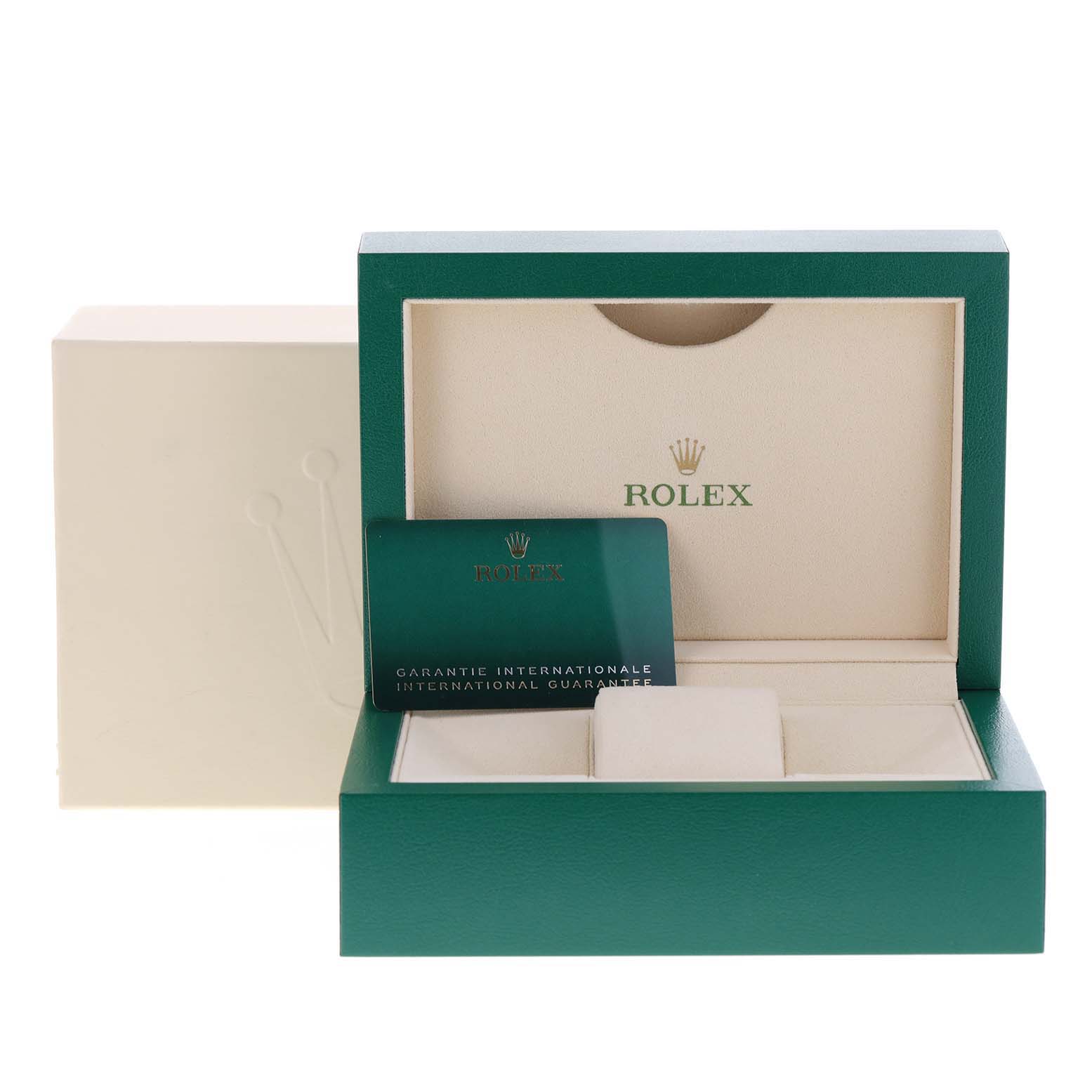 The image shows the open box and interior packaging for a Rolex Mid-Size 277200 Women's Stainless Steel Silver Dial 277200 Women's Stainless Steel Silver Dial watch alongside its international guarantee card.