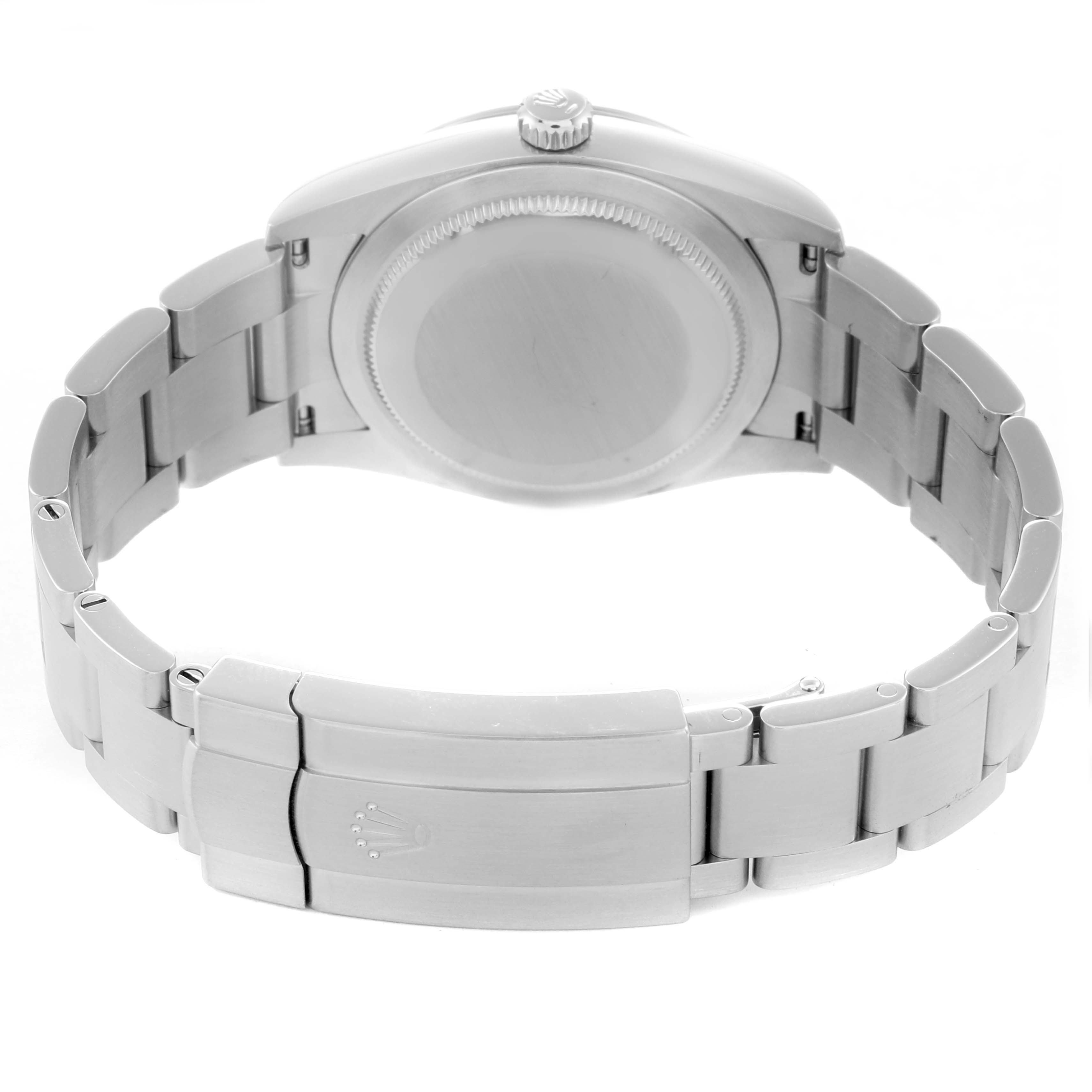 The image shows the back of a Rolex Oyster Perpetual 124200 Men
s Stainless Steel Blue Dial 124200 Men
s Stainless Steel Blue Dial watch, focusing on the case back and the metal bracelet clasp.