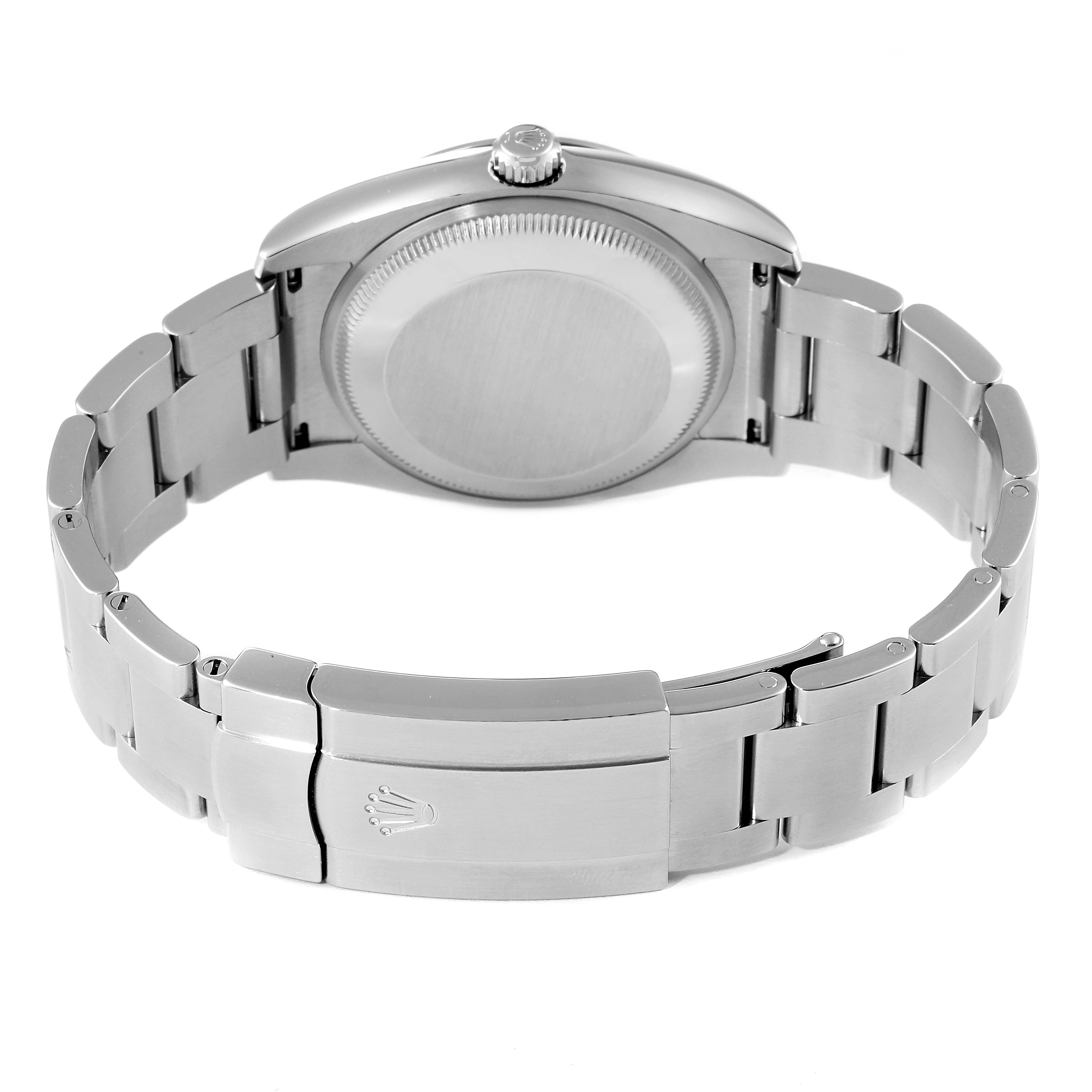 The image shows the back view and clasp of a Rolex Oyster Perpetual 114200 Men's Stainless Steel Burgundy Dial 114200 Men's Stainless Steel Burgundy Dial watch.