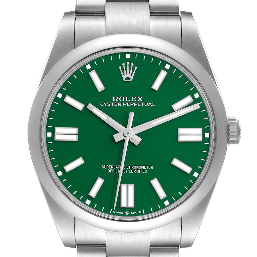 The Rolex Oyster Perpetual watch is shown from the front, highlighting the green dial, bezel, crown, and part of the bracelet.