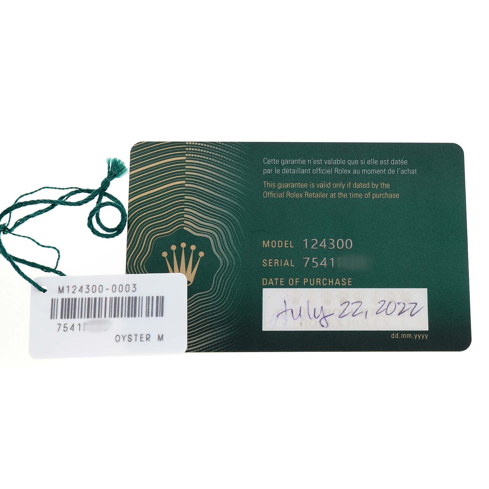 The image shows the warranty card and tag for a Rolex Oyster Perpetual 124300 Men's Stainless Steel Blue Dial, including model and serial numbers.