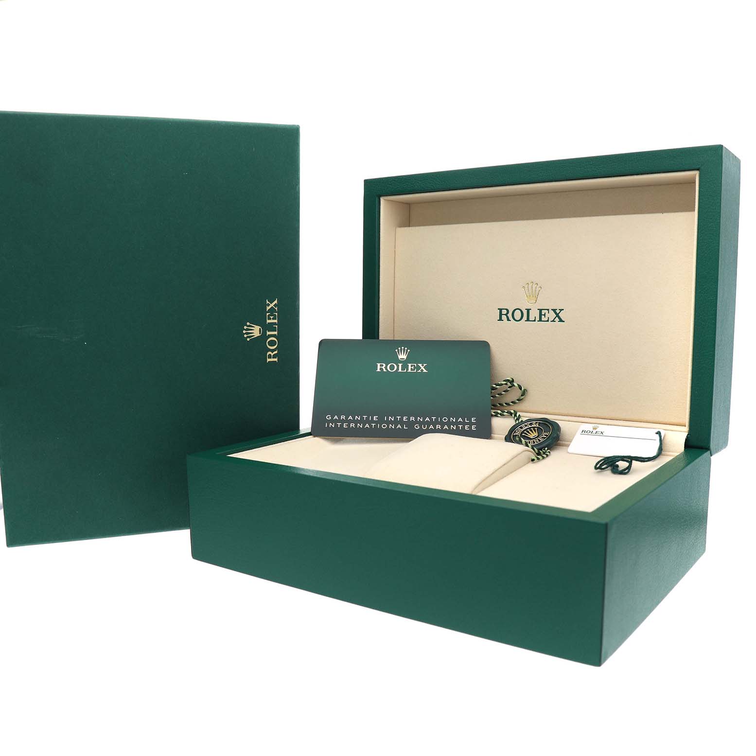 The image shows an open Rolex Oyster Perpetual 134300 Men's Stainless Steel Blue Dial box with the international guarantee card and accessories visible.