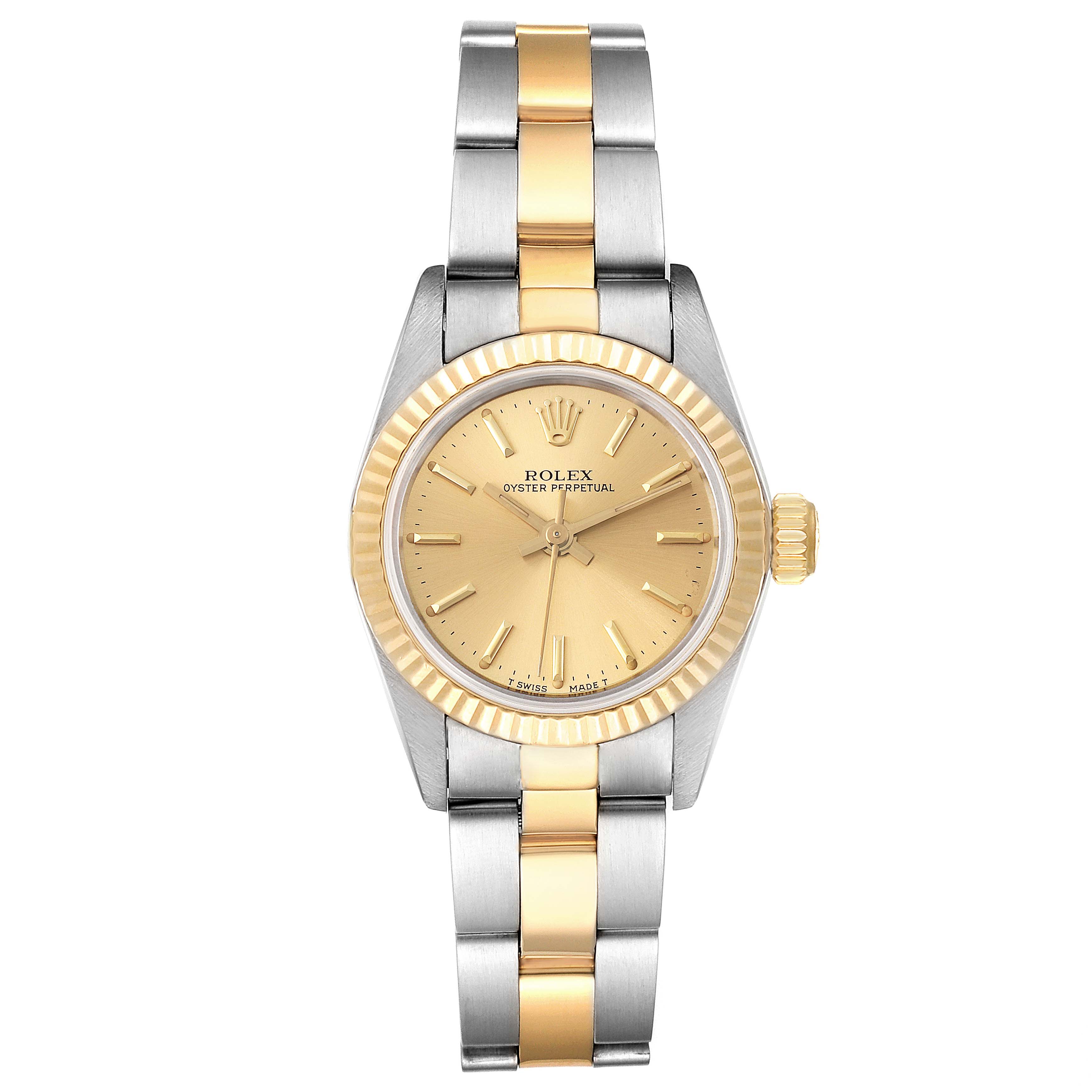 This is a front view of a Rolex Oyster Perpetual 67193 Women
s Steel and Gold (two tone) Champagne Dial 67193 Women
s Steel and Gold (two tone) Champagne Dial watch showing the dial, bezel, crown, and two-tone metal bracelet.