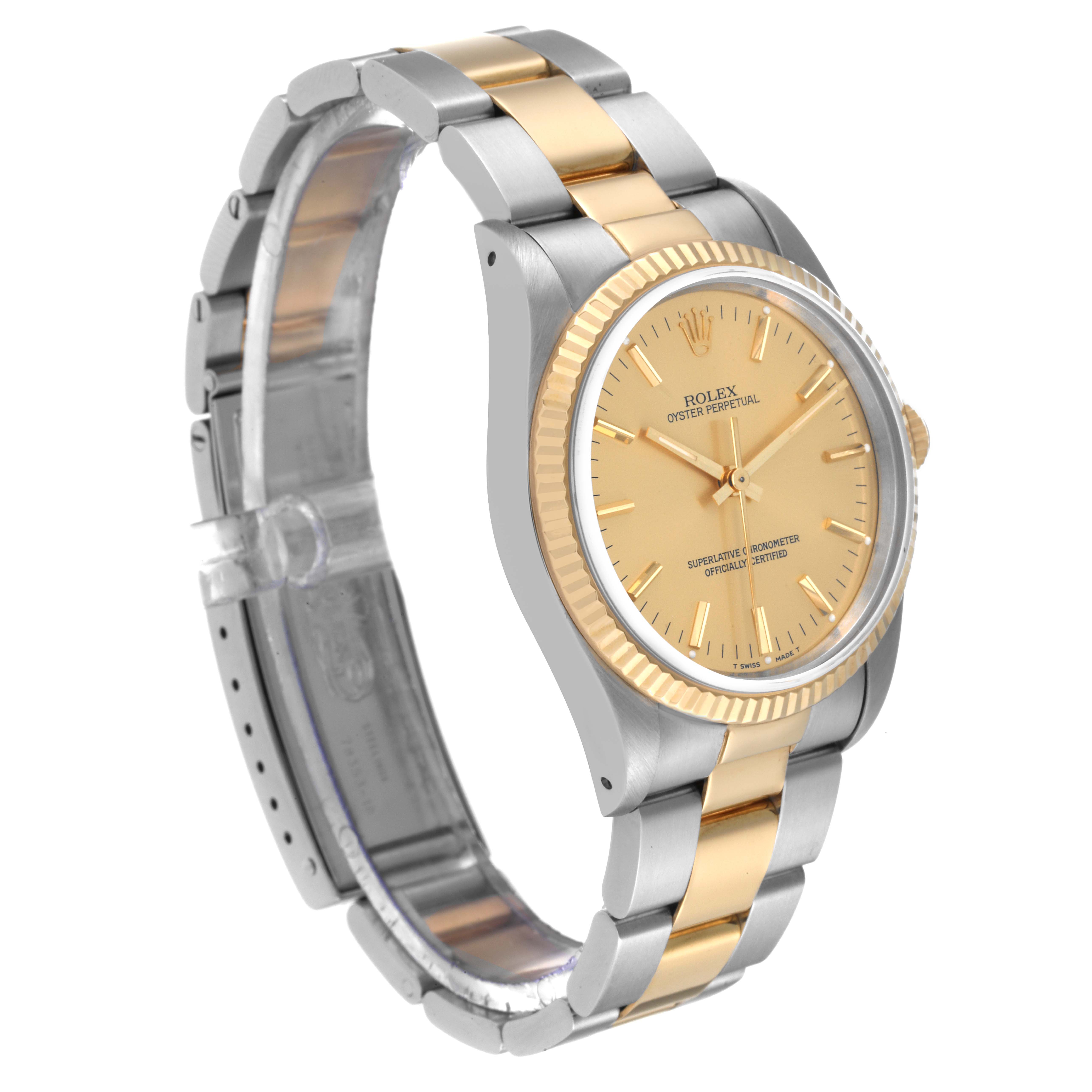 The Rolex Oyster Perpetual 14233 Men's Steel and Gold (two tone) Champagne Dial 14233 Men's Steel and Gold (two tone) Champagne Dial watch is shown at a three-quarter angle, displaying its bezel, dial, and two-tone bracelet.