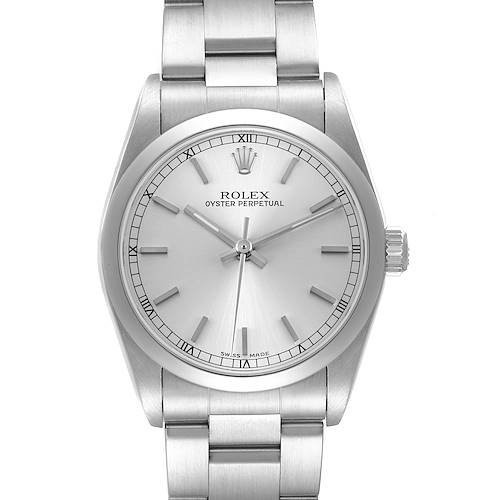 The Rolex Oyster Perpetual 77080 Women's Stainless Steel Silver Dial watch is shown from a top-down angle, highlighting the dial, bezel, and bracelet.