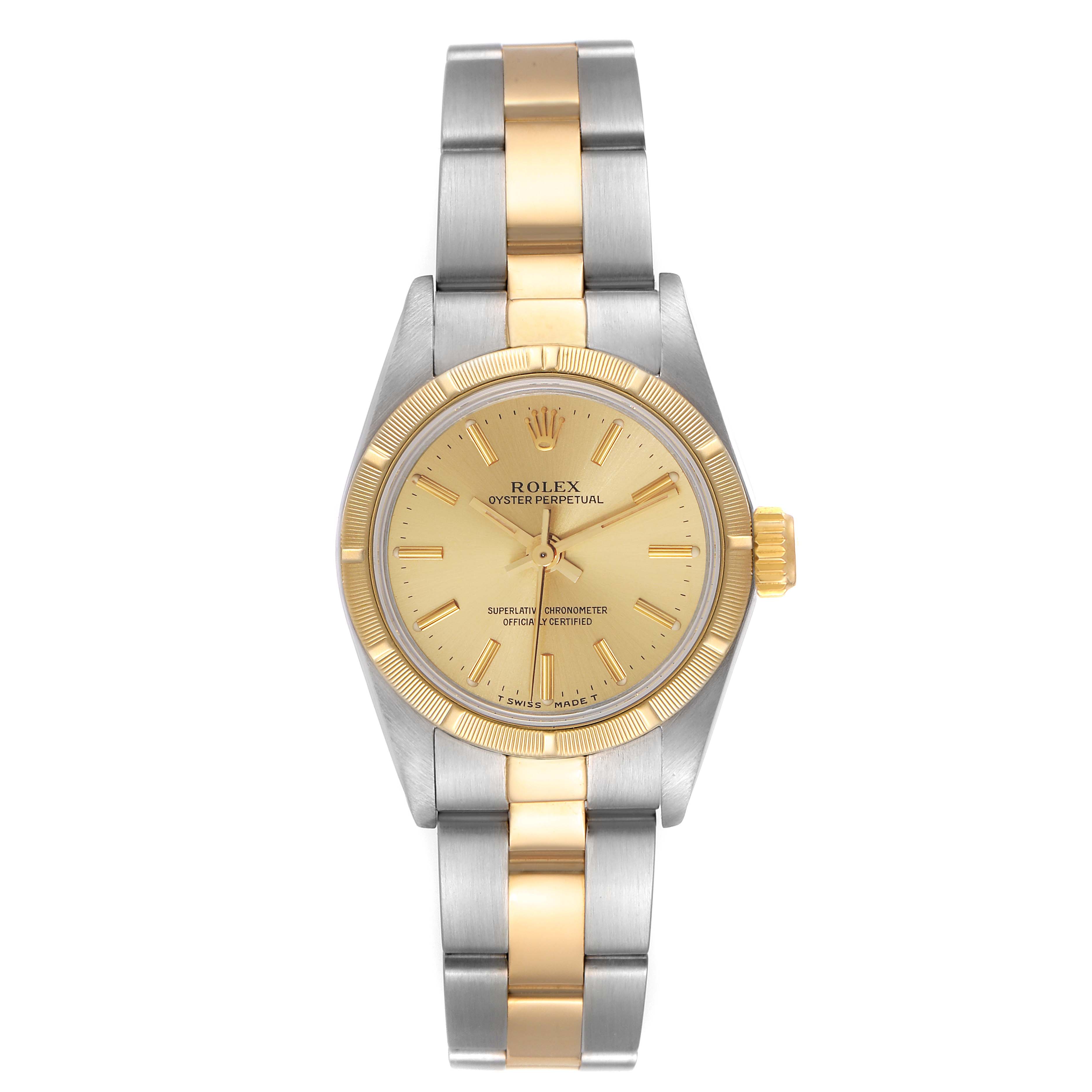 This is a front-view angle of the Rolex Oyster Perpetual 67233 Women
s Steel and Gold (two tone) Champagne Dial 67233 Women
s Steel and Gold (two tone) Champagne Dial watch, showcasing the face, bezel, and two-tone bracelet.