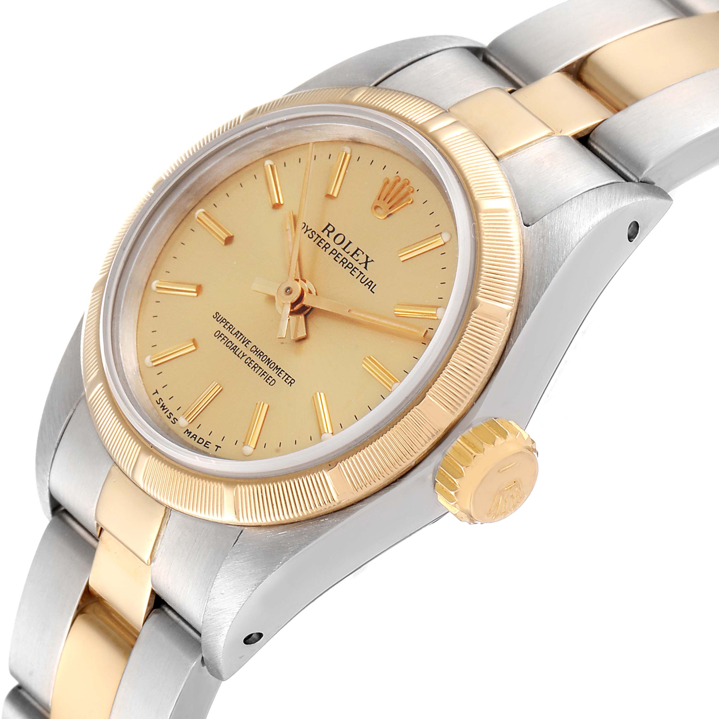 This Rolex Oyster Perpetual 67233 Women
s Steel and Gold (two tone) Champagne Dial 67233 Women
s Steel and Gold (two tone) Champagne Dial watch is displayed at an angle emphasizing the dial, bezel, crown, and partly the bracelet.