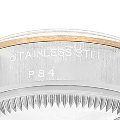 This close-up image displays the edge of the bezel and the case side of a Rolex Oyster Perpetual 76183 Women's Steel and Gold (two tone) Grey Dial 76183 Women's Steel and Gold (two tone) Grey Dial watch, with engravings visible.