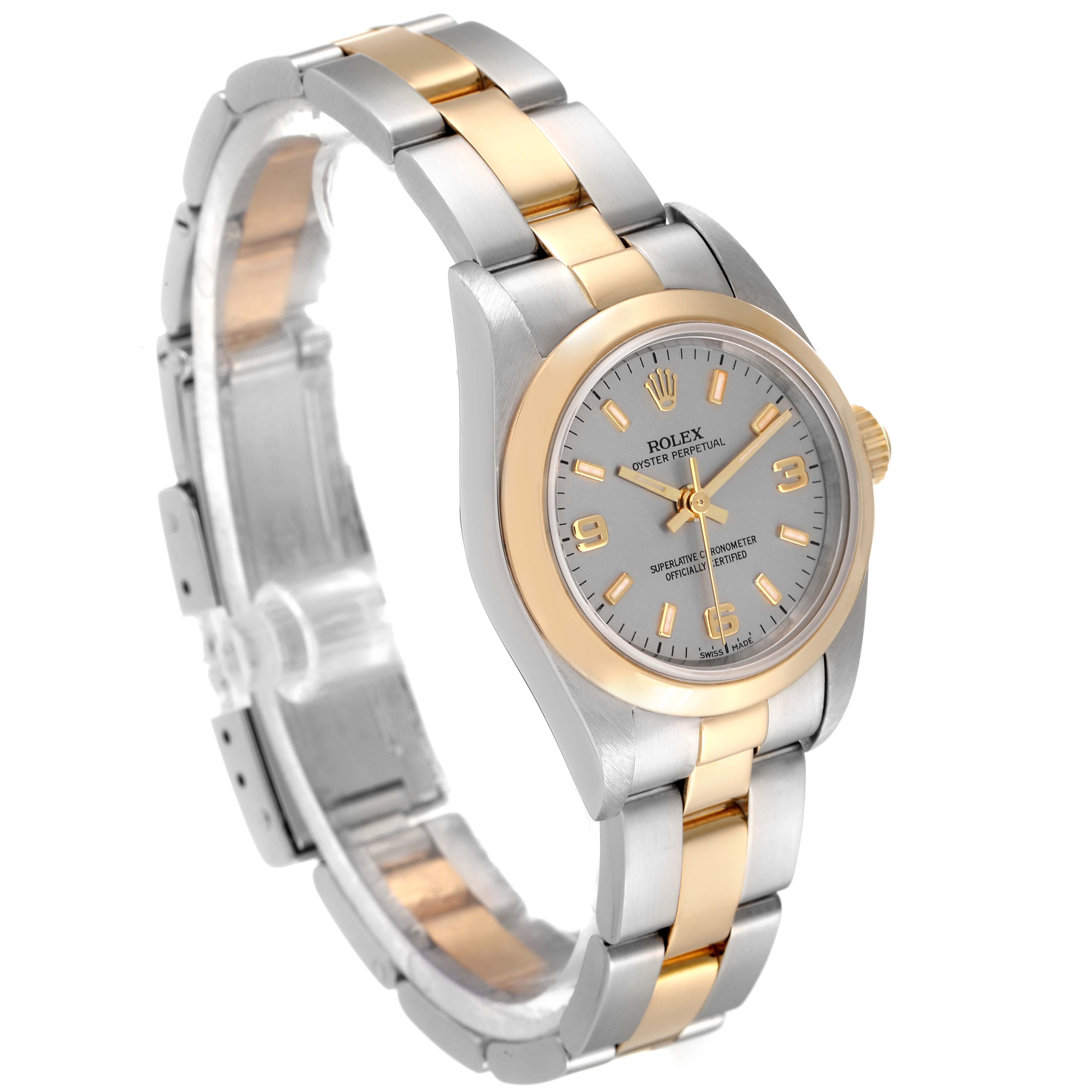 This image shows a side-angle view of the Rolex Oyster Perpetual 76183 Women's Steel and Gold (two tone) Grey Dial 76183 Women's Steel and Gold (two tone) Grey Dial watch, highlighting the face and two-tone bracelet.
