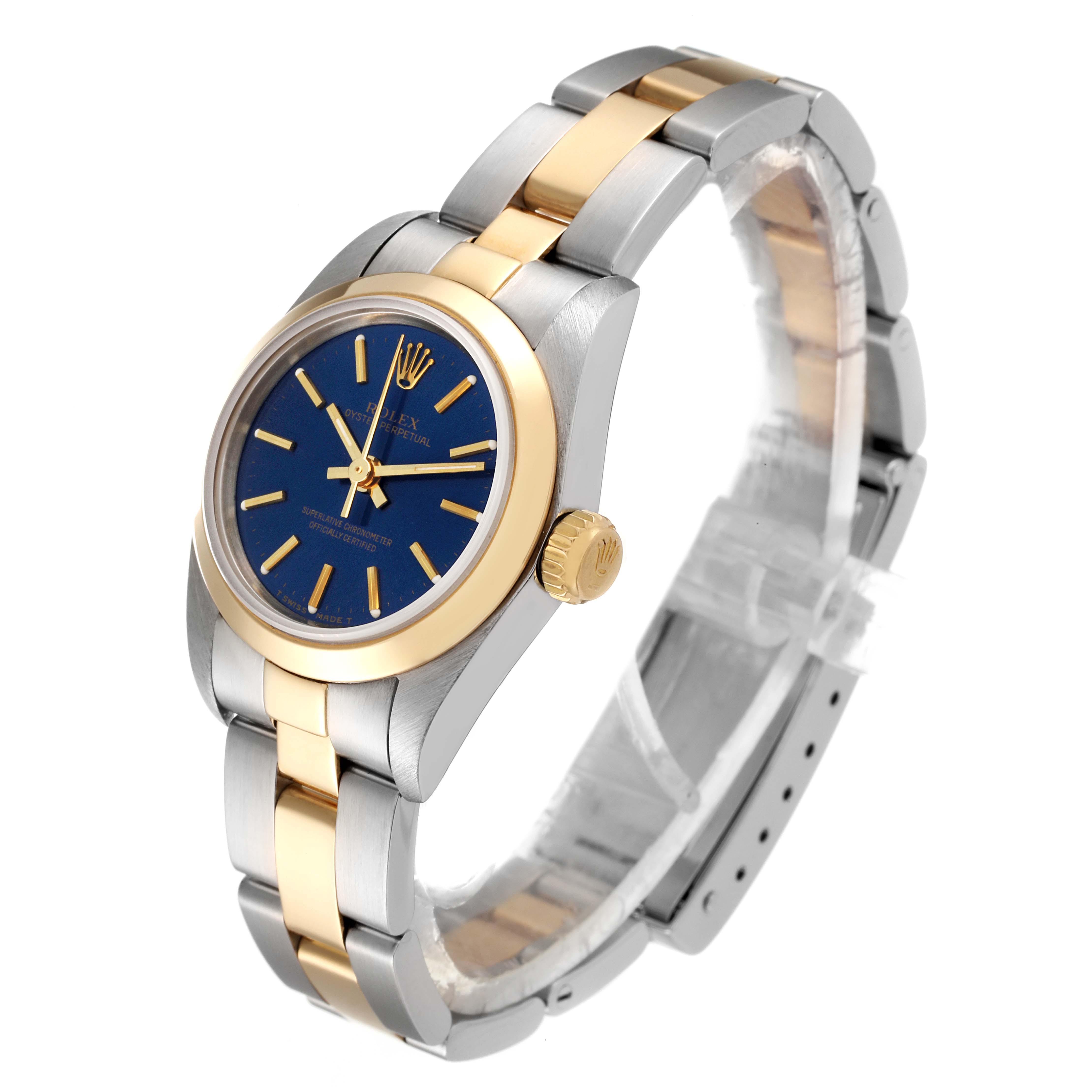 The image shows a Rolex Oyster Perpetual 67183 Women
s Steel and Gold (two tone) Blue Dial 67183 Women
s Steel and Gold (two tone) Blue Dial watch at an angle highlighting the dial, bezel, crown, and bracelet.
