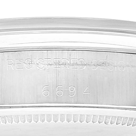 This image shows a close-up view of the case back engraving for a Rolex Date 6694 Men's Stainless Steel Black Dial 6694 Men's Stainless Steel Black Dial model watch.