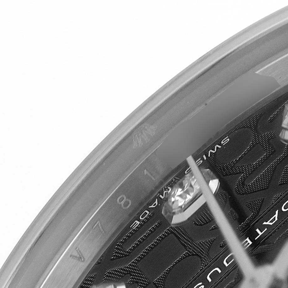 The image shows a close-up of the dial and gem markers of a Rolex Pearlmaster 81299 Women's White Gold Black Dial, viewed from the side angle.