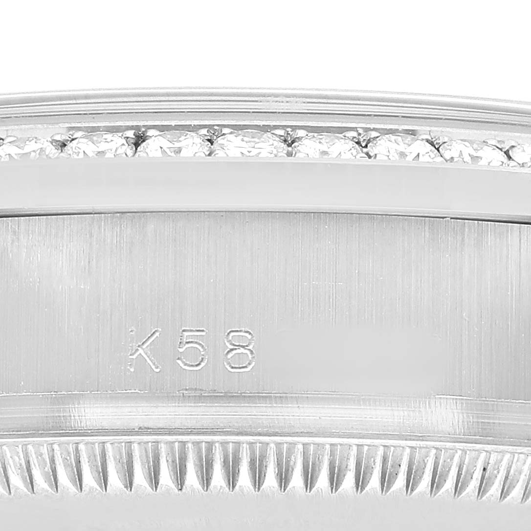 The image shows a close-up of the bezel and edge with markings on the Rolex President 178159 Women's White Gold Silver Dial model watch.
