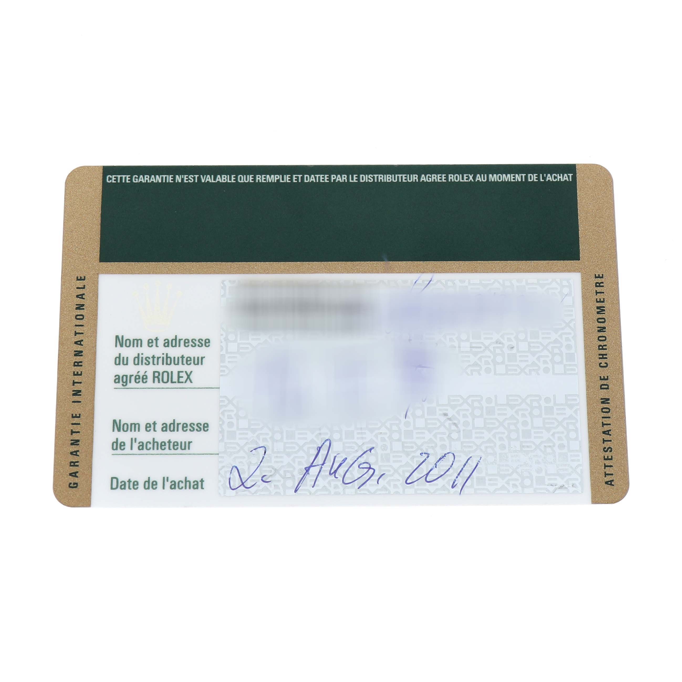 The image shows a warranty card for the Rolex President 218348 Men's Yellow Gold Champagne Dial model, featuring text and a date, viewed from above.