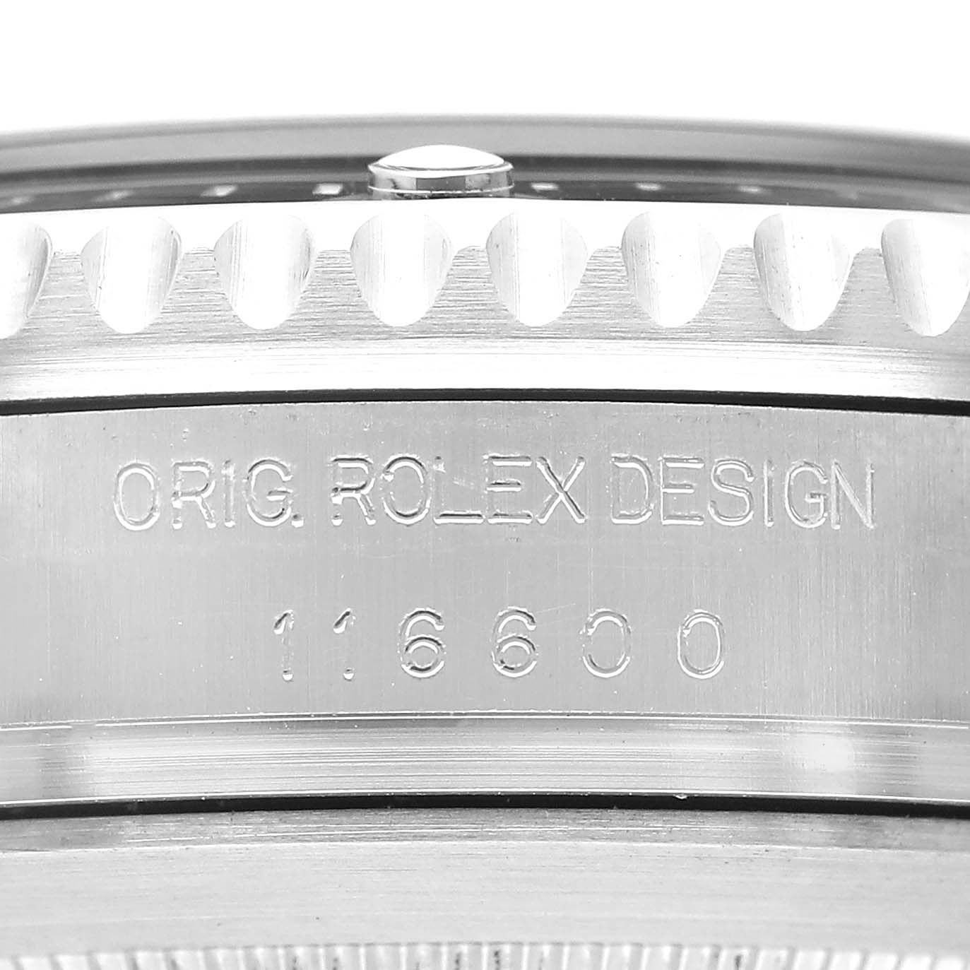 The image shows the side engraving on the bezel of a Rolex Sea-Dweller 116600 Men's Stainless Steel Black Dial, featuring its model number.