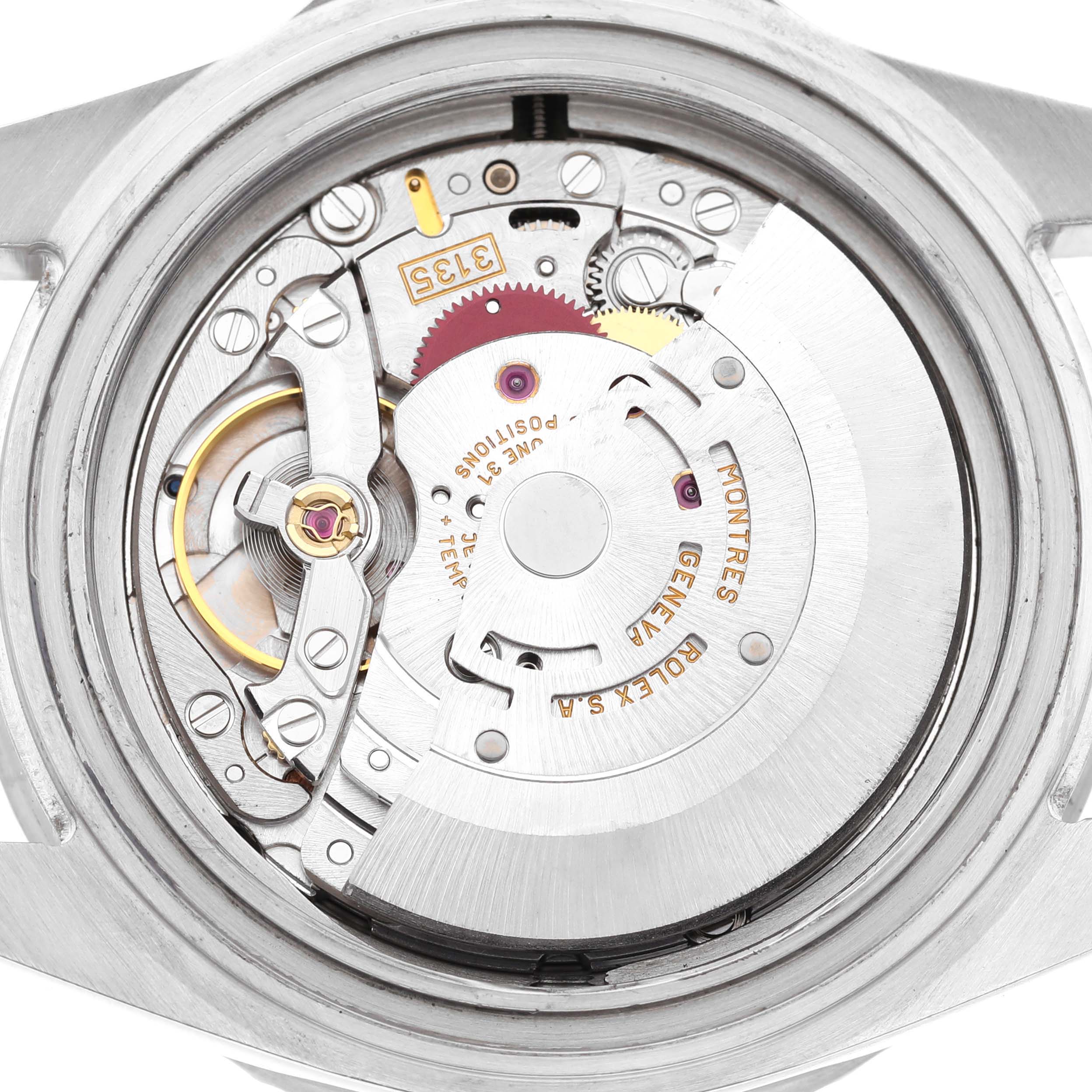 The image shows the Rolex Sea-Dweller 16600 Men's Stainless Steel Black Dial's movement from the back, displaying gears and the rotor.