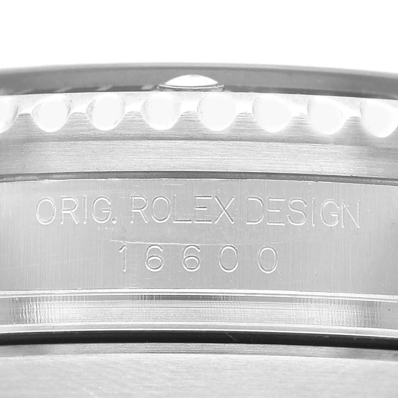 The image shows a close-up of the case side of a Rolex Sea-Dweller 16600 Men's Stainless Steel Black Dial, highlighting the model number engravings.