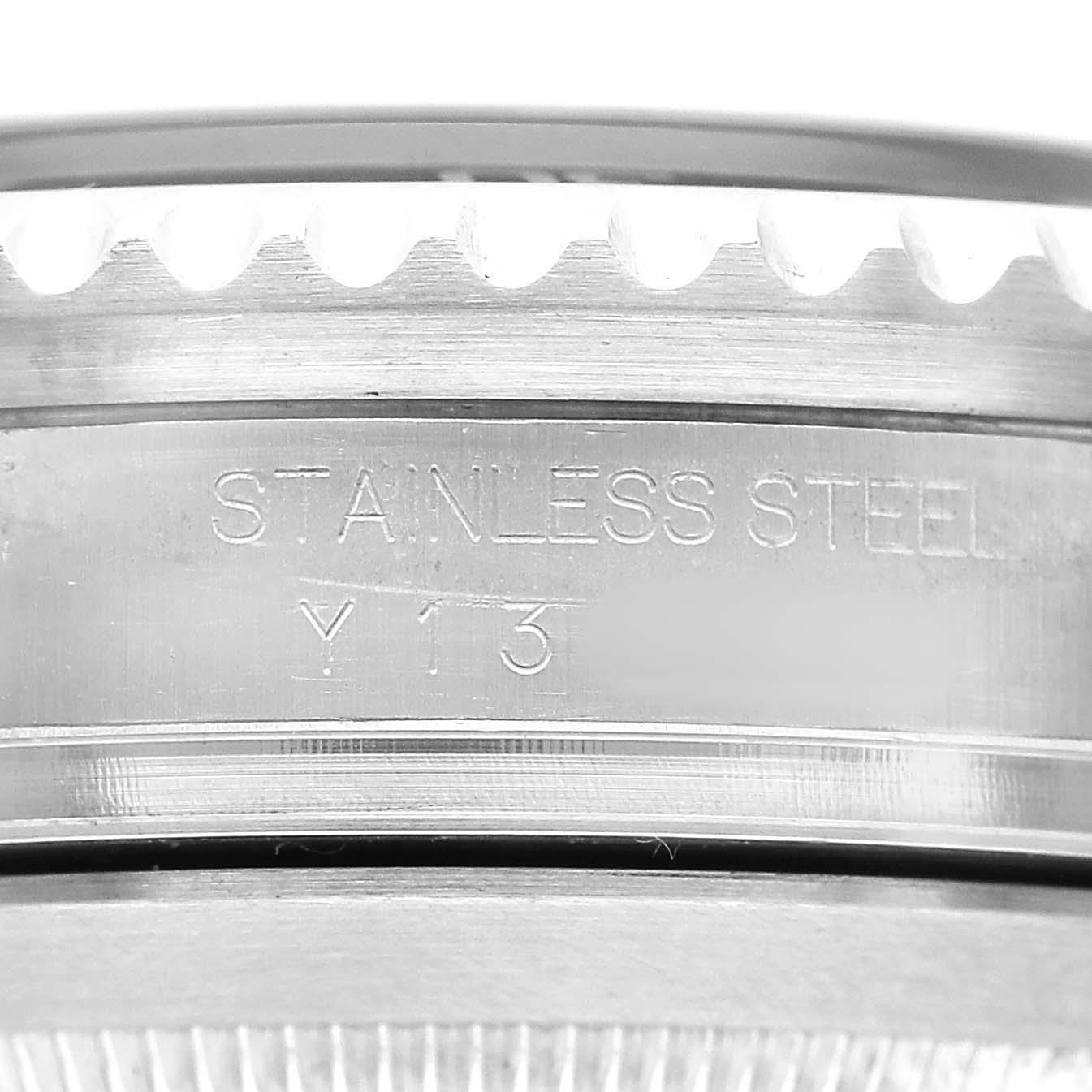 The image shows a close-up of the side edge of a Rolex Sea-Dweller 16600 Men's Stainless Steel Black Dial, highlighting its stainless steel engraving.