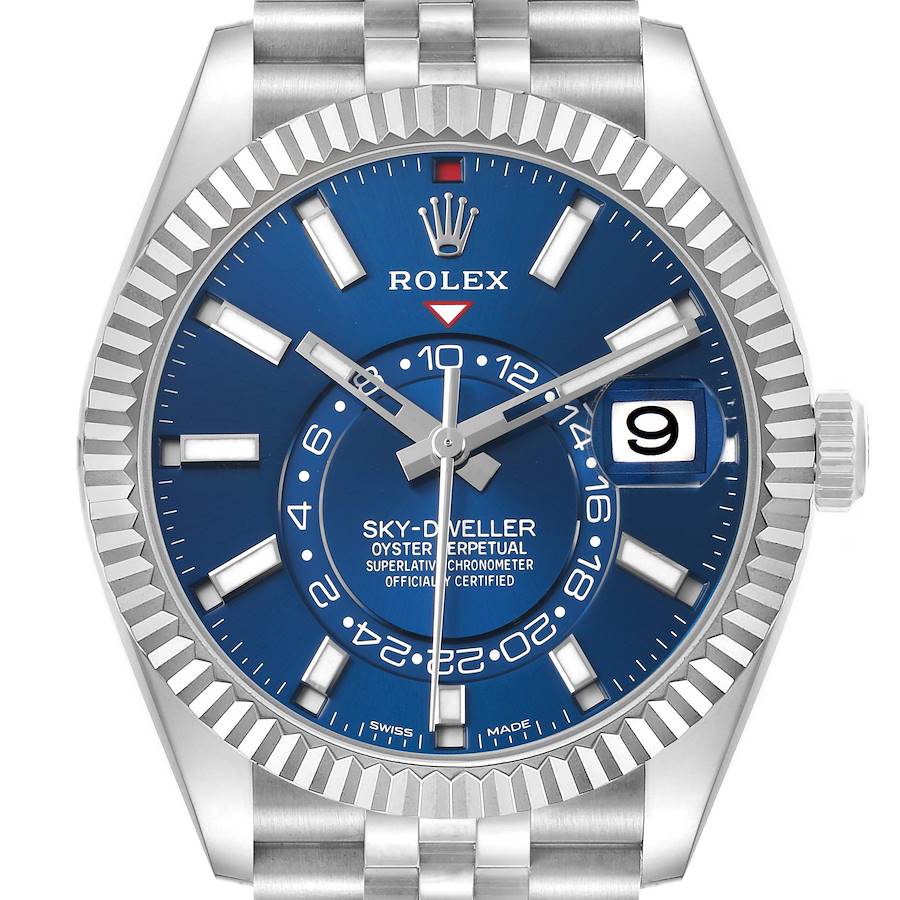 The Rolex Sky-Dweller 326934 Men's Stainless Steel Blue Dial watch is shown from a front angle, highlighting its blue dial, fluted bezel, and date window.