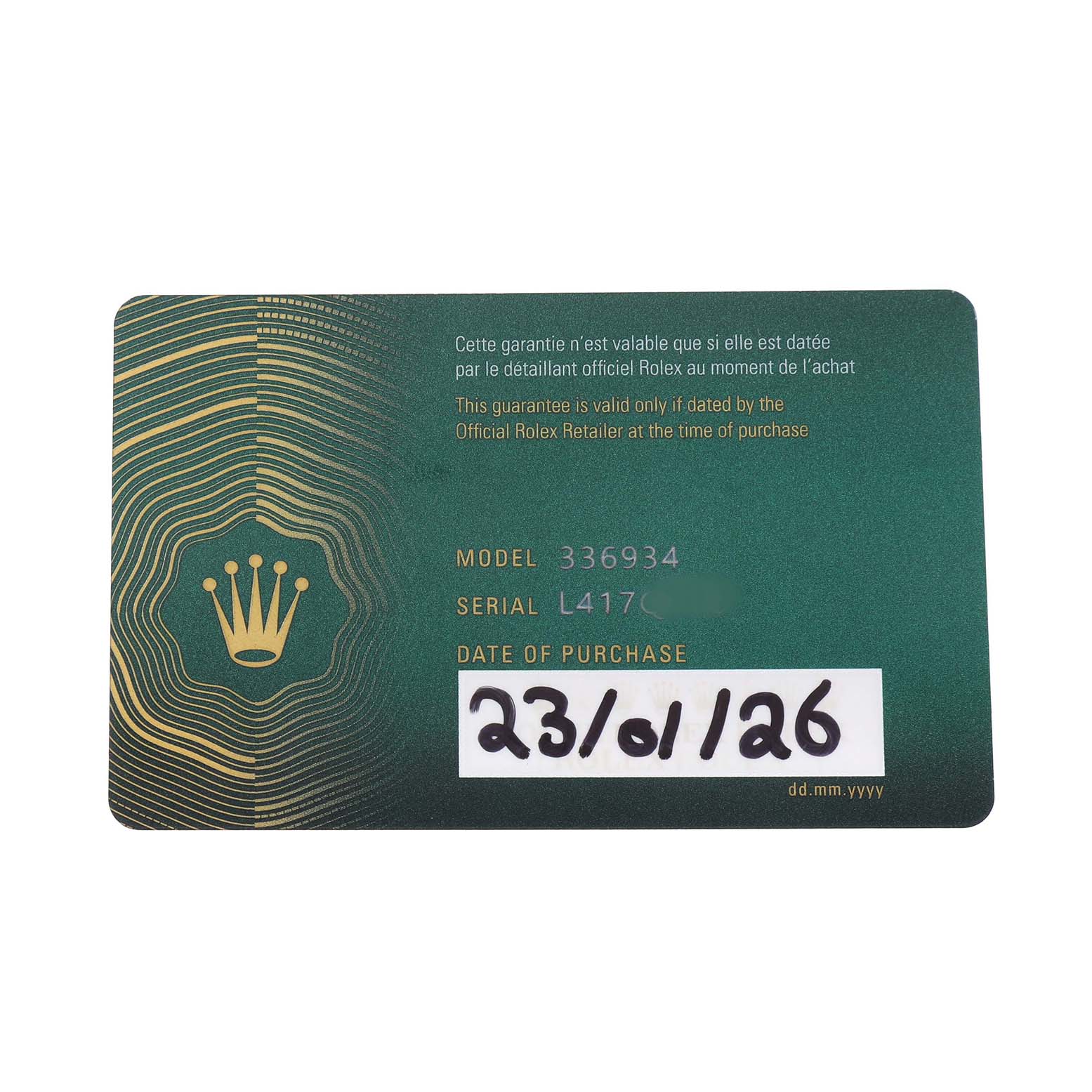 The image shows a green warranty card for a Rolex Sky-Dweller 336934 Men's Stainless Steel Green Dial, displaying model, serial number, and purchase date.