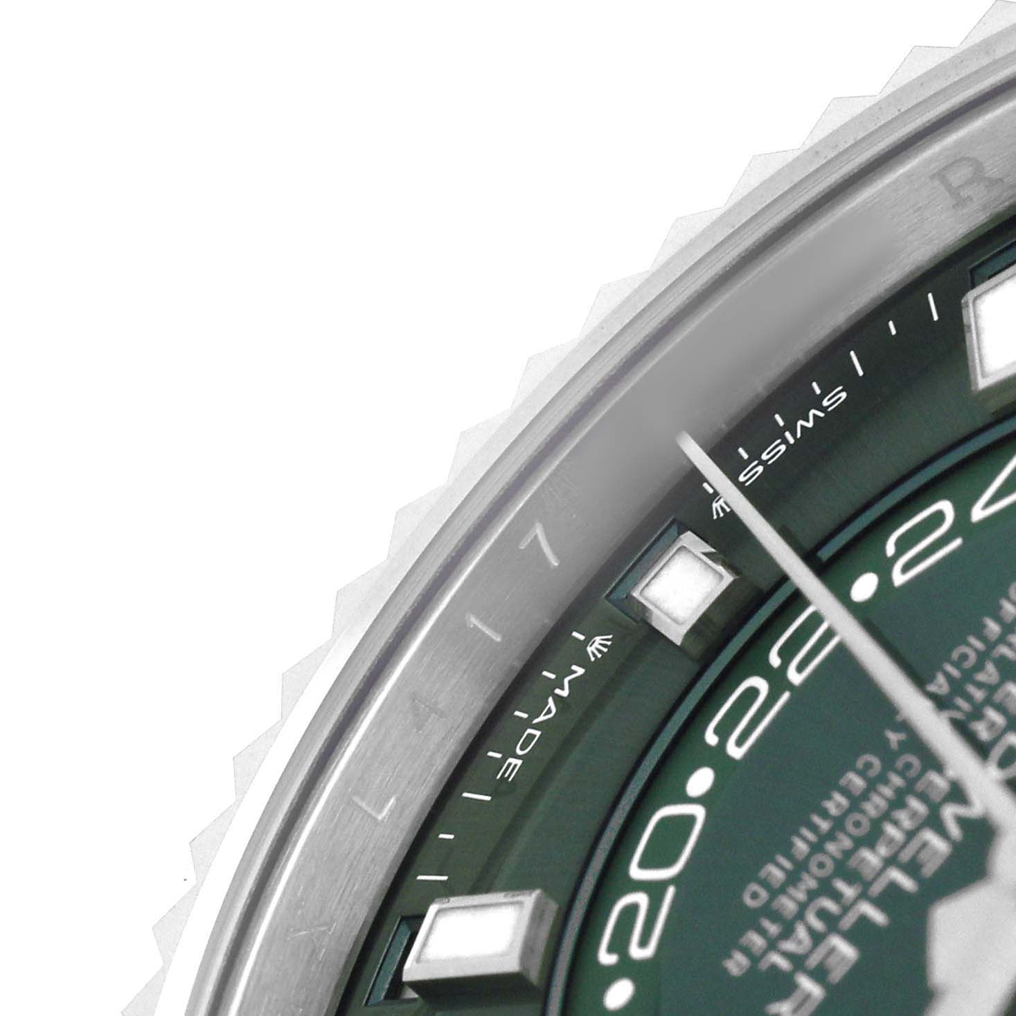 The image shows a close-up of a Rolex Sky-Dweller 336934 Men's Stainless Steel Green Dial watch face, highlighting the bezel, dial, and markers.