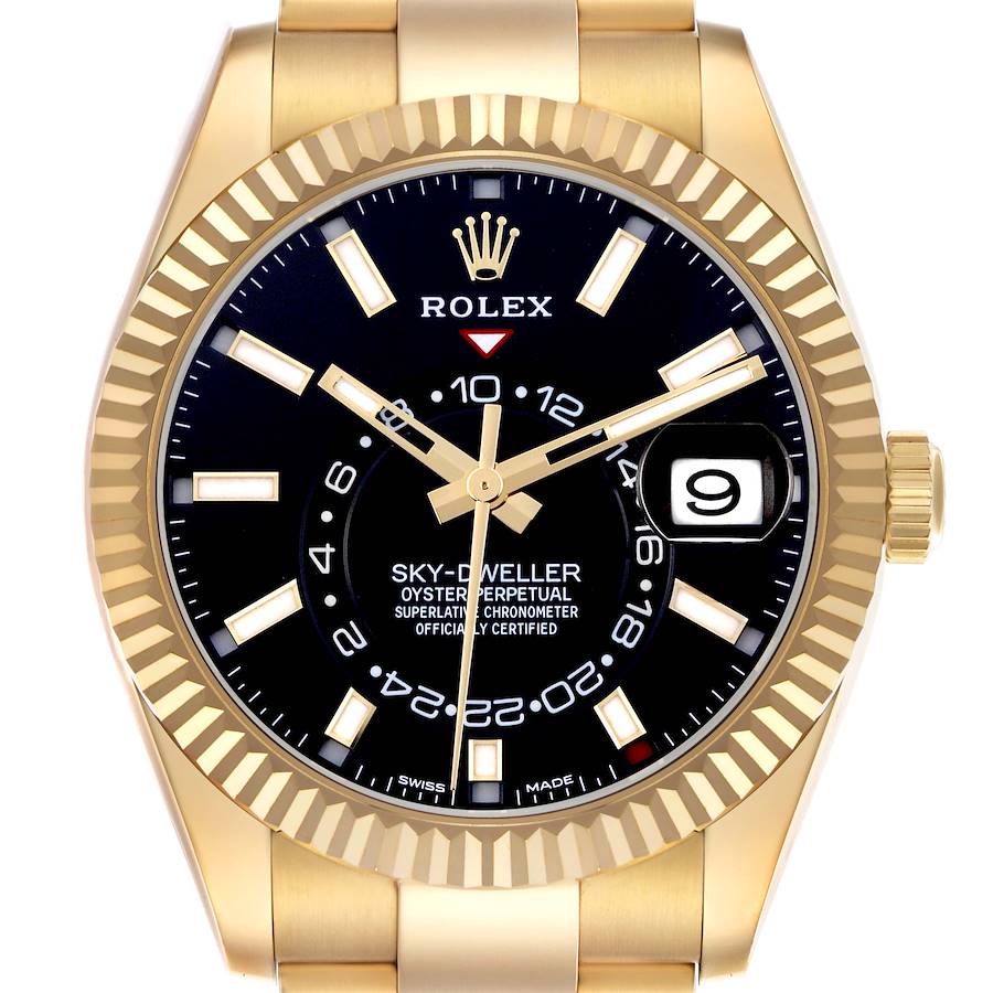 The Rolex Sky-Dweller watch is shown from a front angle, highlighting its black dial, gold case, and bezel.