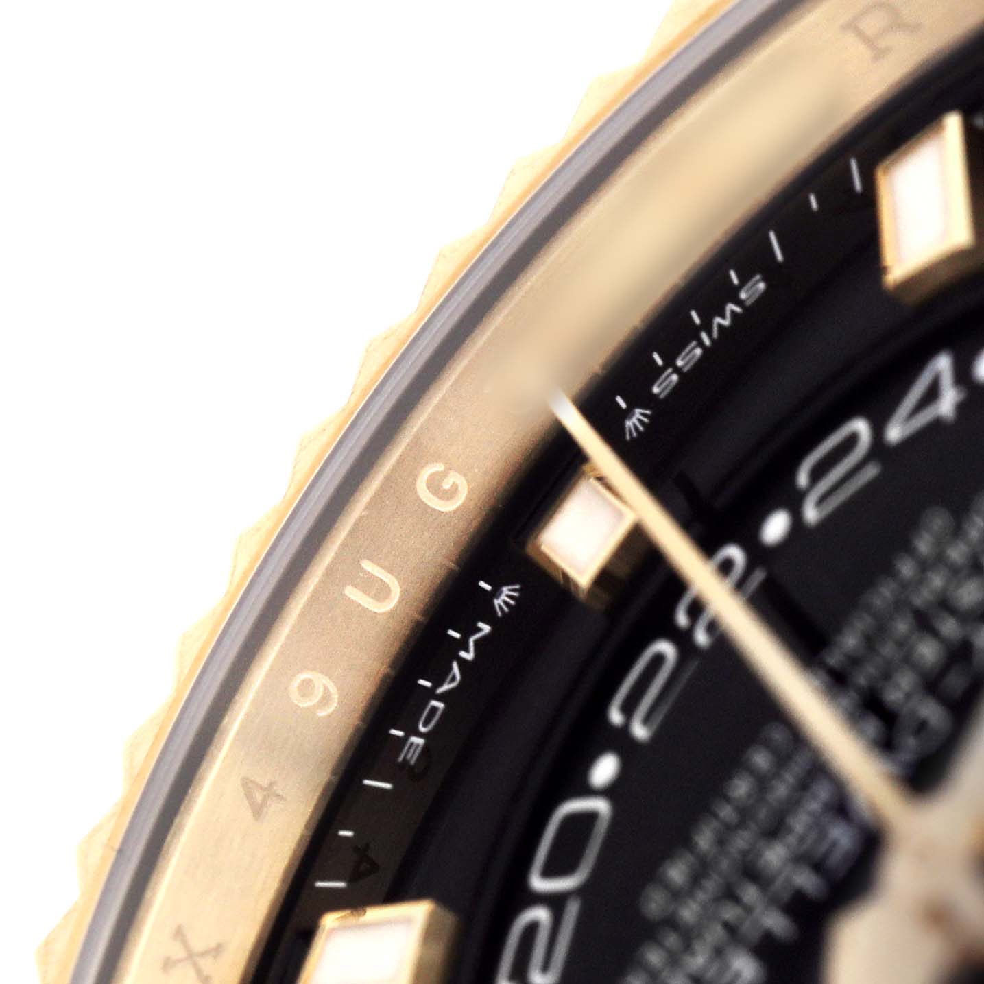 The image shows a close-up of the bezel and dial of a Rolex Sky-Dweller 336938 Men's Yellow Gold Black Dial, highlighting the date indicator and part of the hour markers.