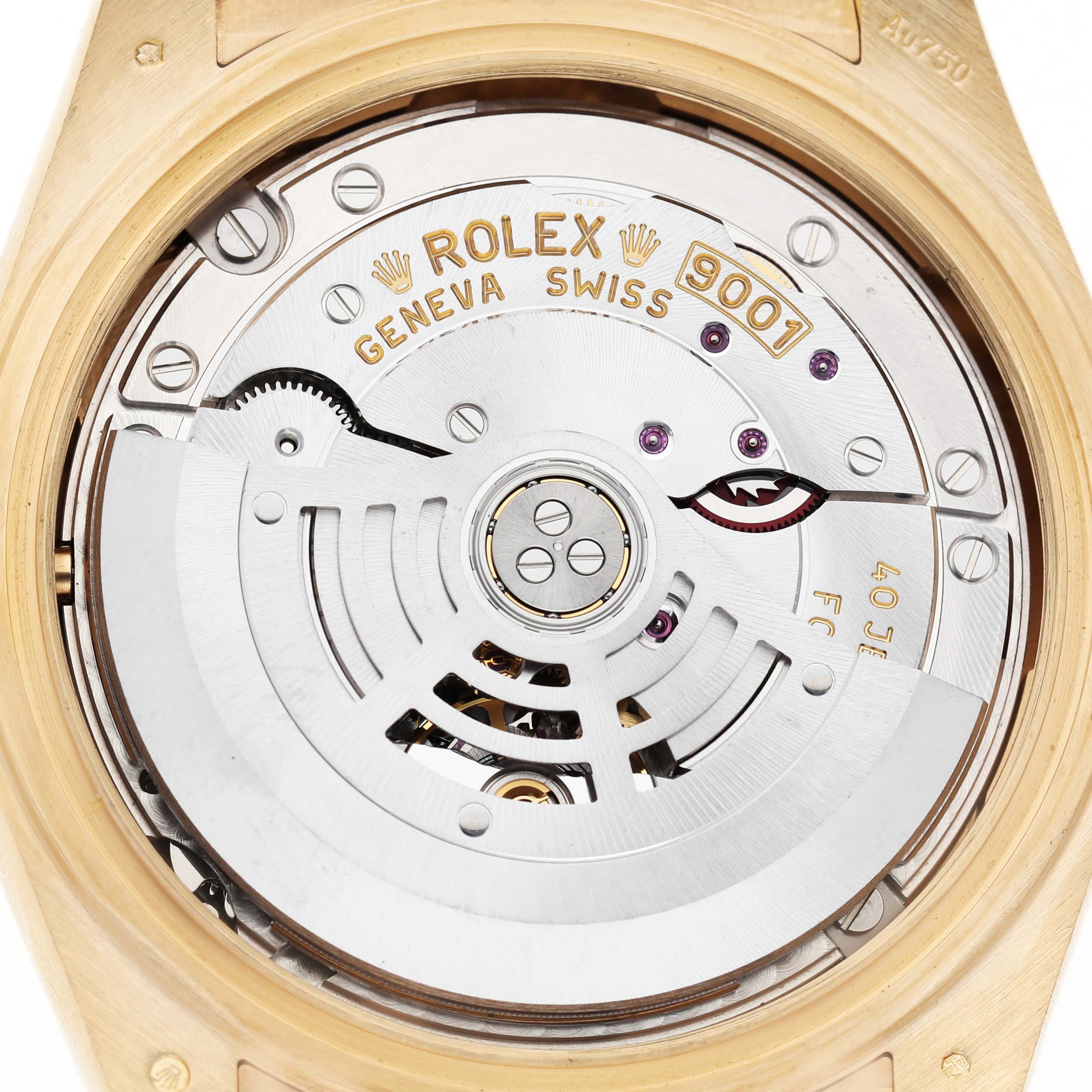 This image shows the movement of a Rolex Sky-Dweller 326238 Men's Yellow Gold White Dial watch from a rear angle, revealing its intricate mechanics and rotor.