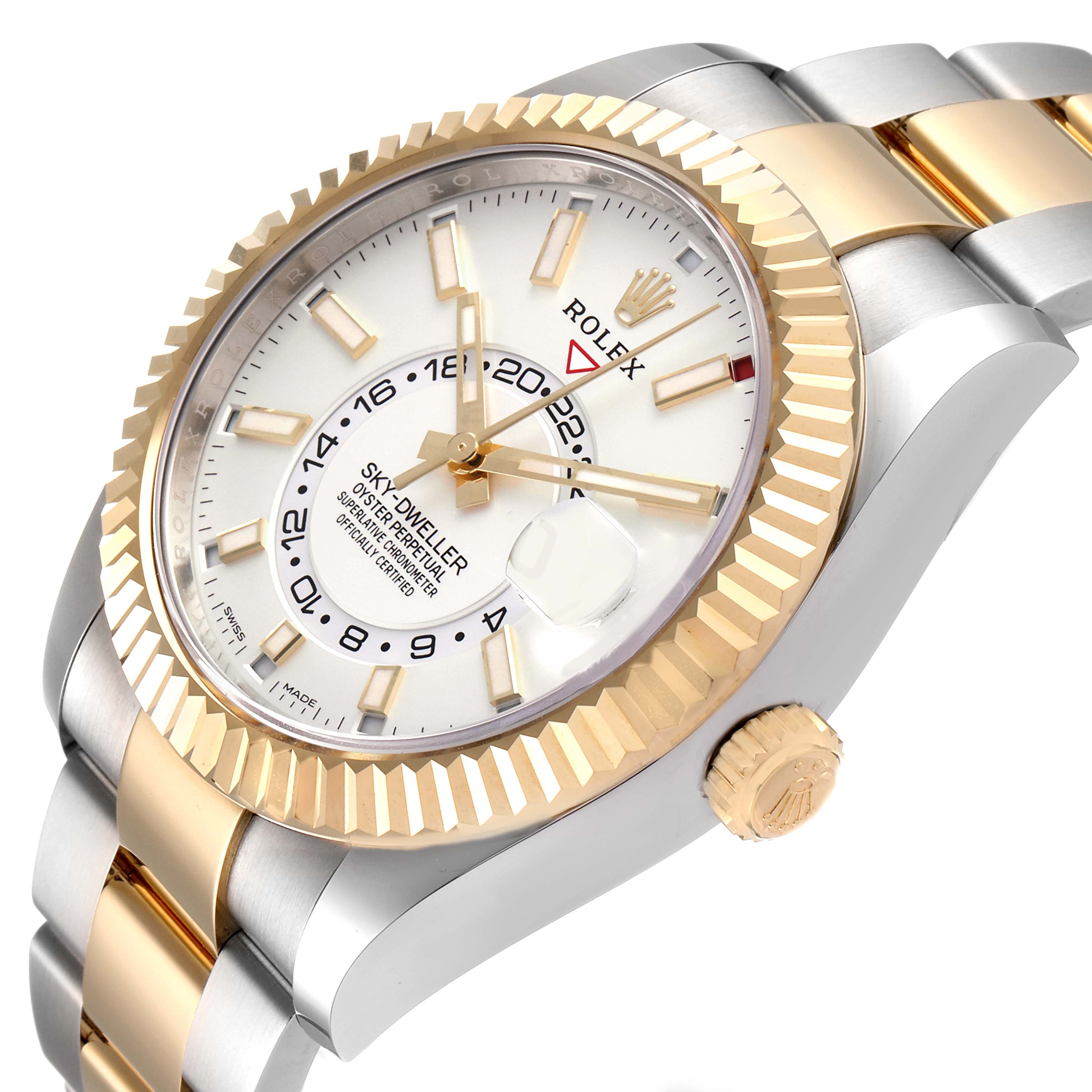 The image shows a side-angle view of the Rolex Sky-Dweller 326933 Men's Steel and Gold (two tone) White Dial 326933 Men's Steel and Gold (two tone) White Dial watch, displaying its crown, bezel, and part of the bracelet.