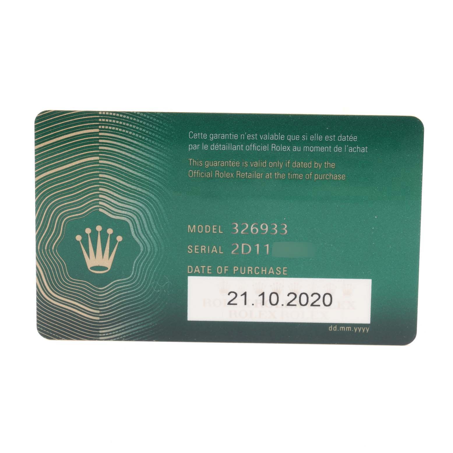 This is a green Rolex warranty card for the Sky-Dweller model, showing the model number, serial number, and date of purchase.