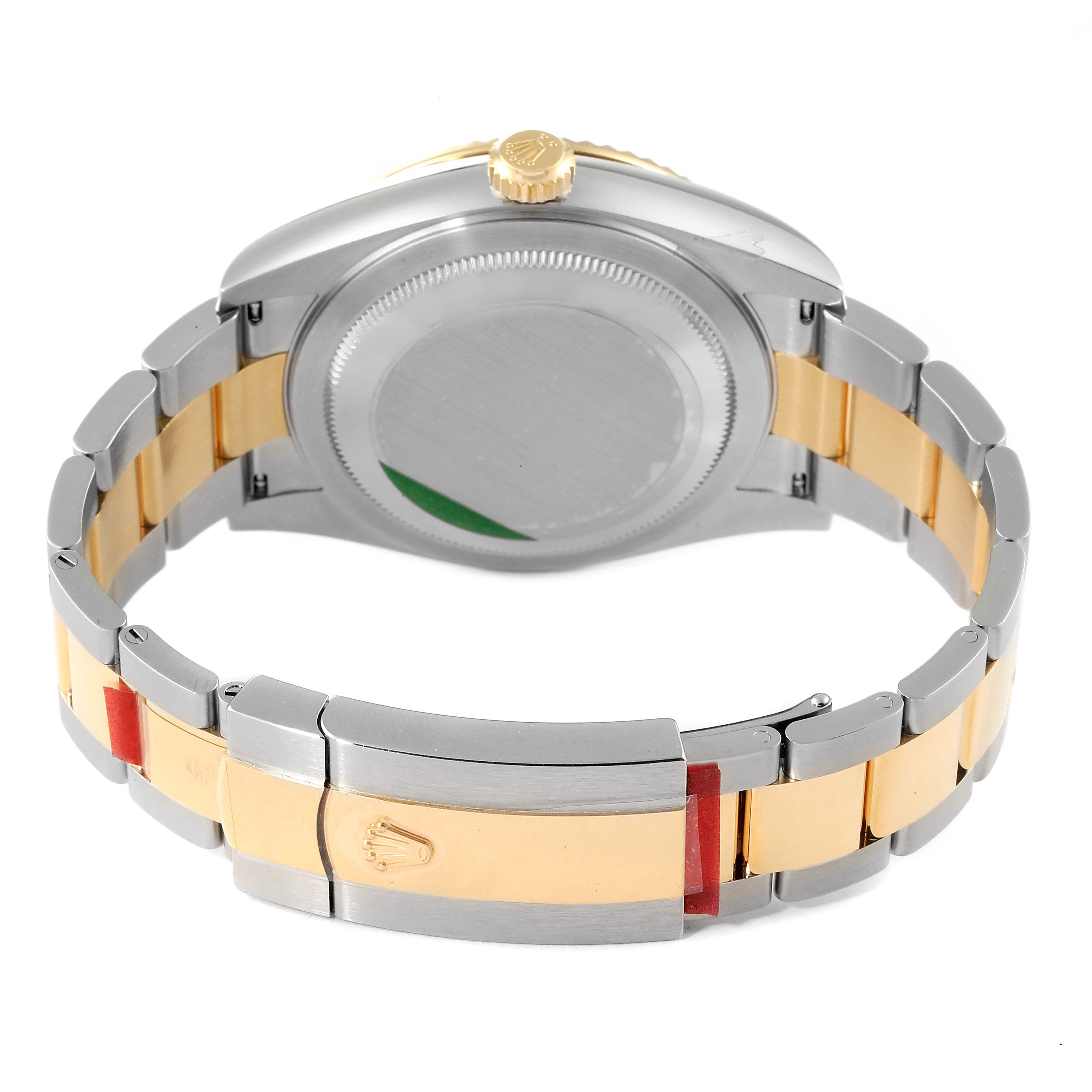 The image shows the back view and clasp of a Rolex Sky-Dweller 326933 Men's Steel and Gold (two tone) White Dial 326933 Men's Steel and Gold (two tone) White Dial watch with a two-tone metal band.