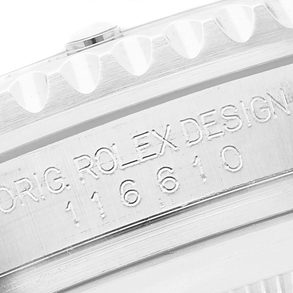 This close-up image shows the side of a Rolex Submariner 116610 Men
s Stainless Steel Black Dial 116610 Men
s Stainless Steel Black Dial watch case, featuring its engraved model number.