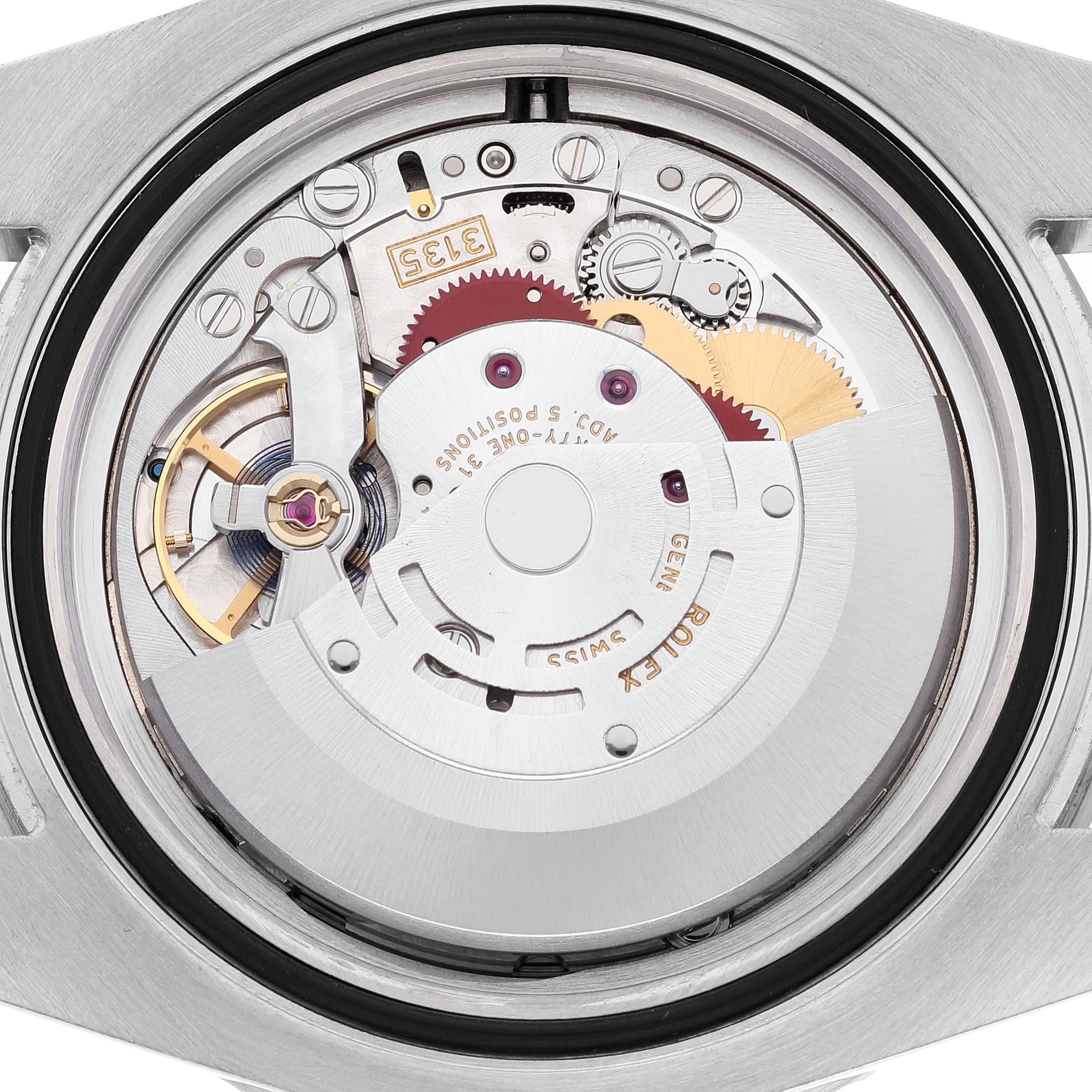 This image shows a close-up view of the movement inside a Rolex Submariner 116610 Men
s Stainless Steel Black Dial 116610 Men
s Stainless Steel Black Dial watch.