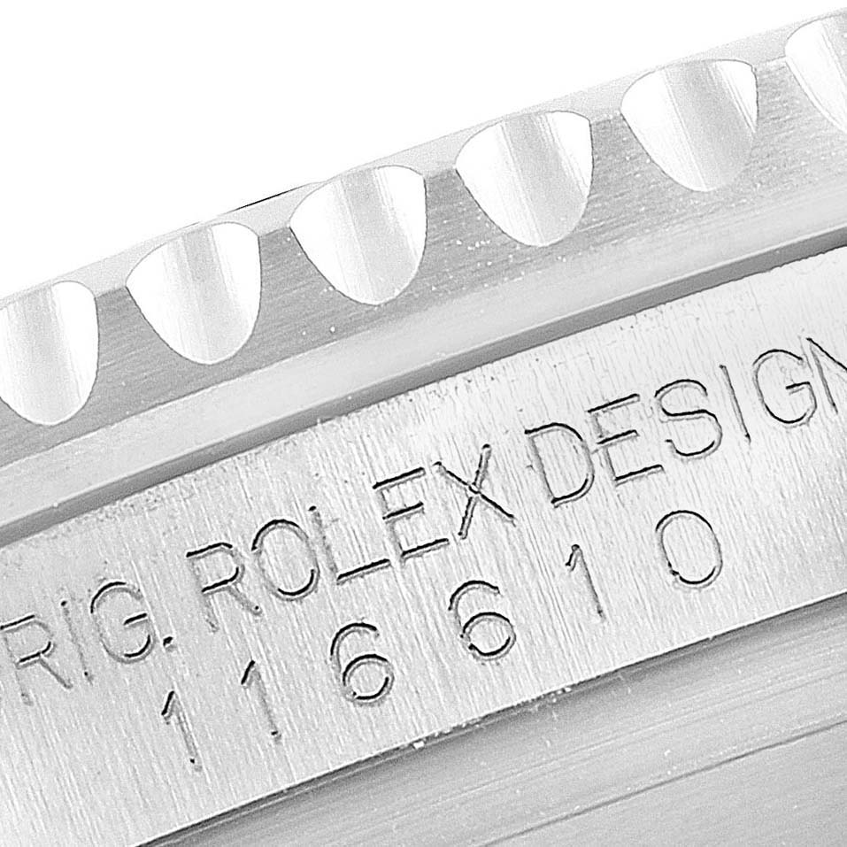 This image shows a close-up of the bezel and case side with the engraved serial number of a Rolex Submariner 116610LN Men
s Stainless Steel Black Dial 116610LN Men
s Stainless Steel Black Dial.