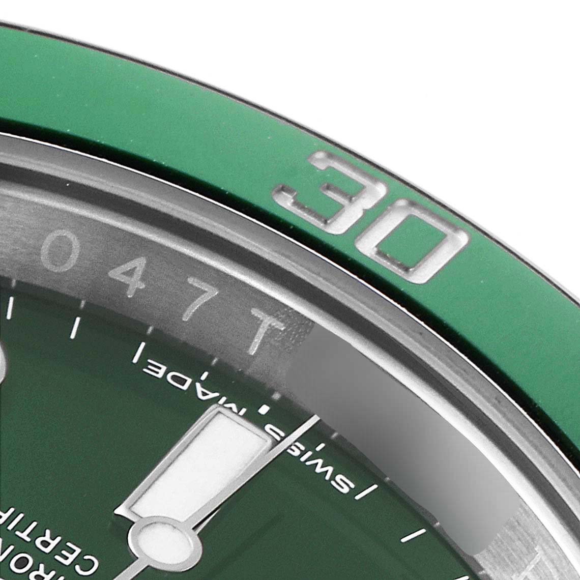 The image shows a close-up of the green bezel and part of the dial of a Rolex Submariner 116610LV Men
s Stainless Steel Green Dial 116610LV Men
s Stainless Steel Green Dial watch, highlighting the "30" minute marker.