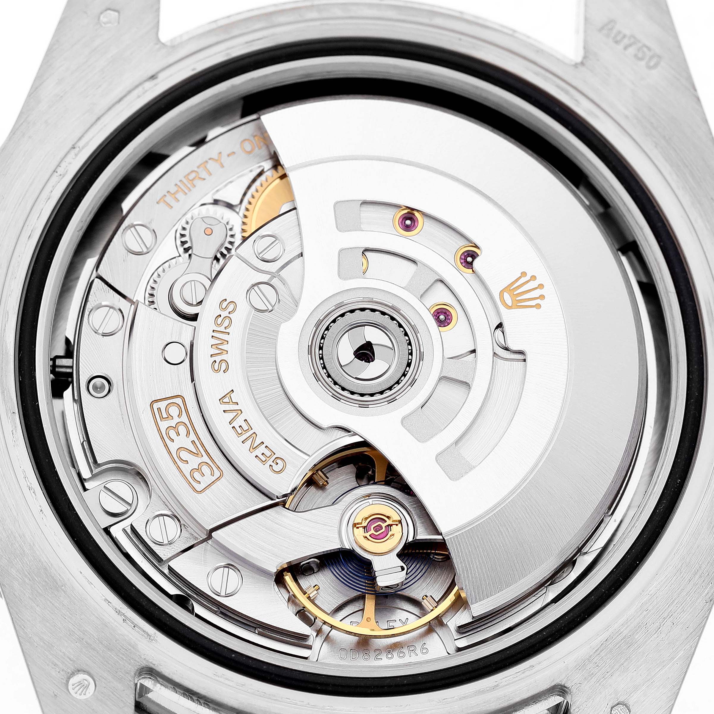 The image shows the movement of a Rolex Submariner 126619 Men's White Gold Black Dial watch from a back angle, highlighting its intricate mechanical components.