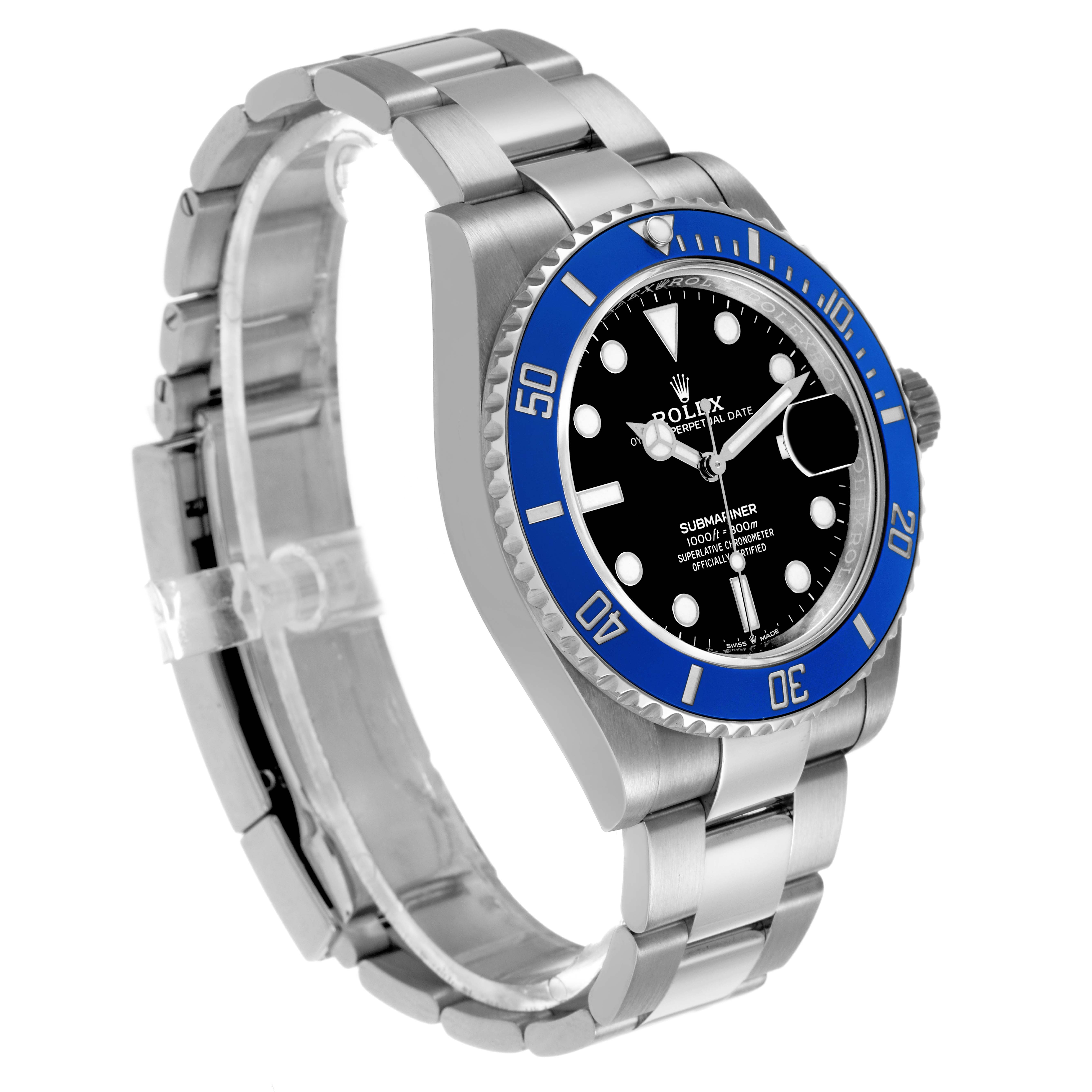 The Rolex Submariner 126619 Men's White Gold Black Dial watch is shown at an angled side view displaying its blue bezel, black dial, and stainless steel bracelet.
