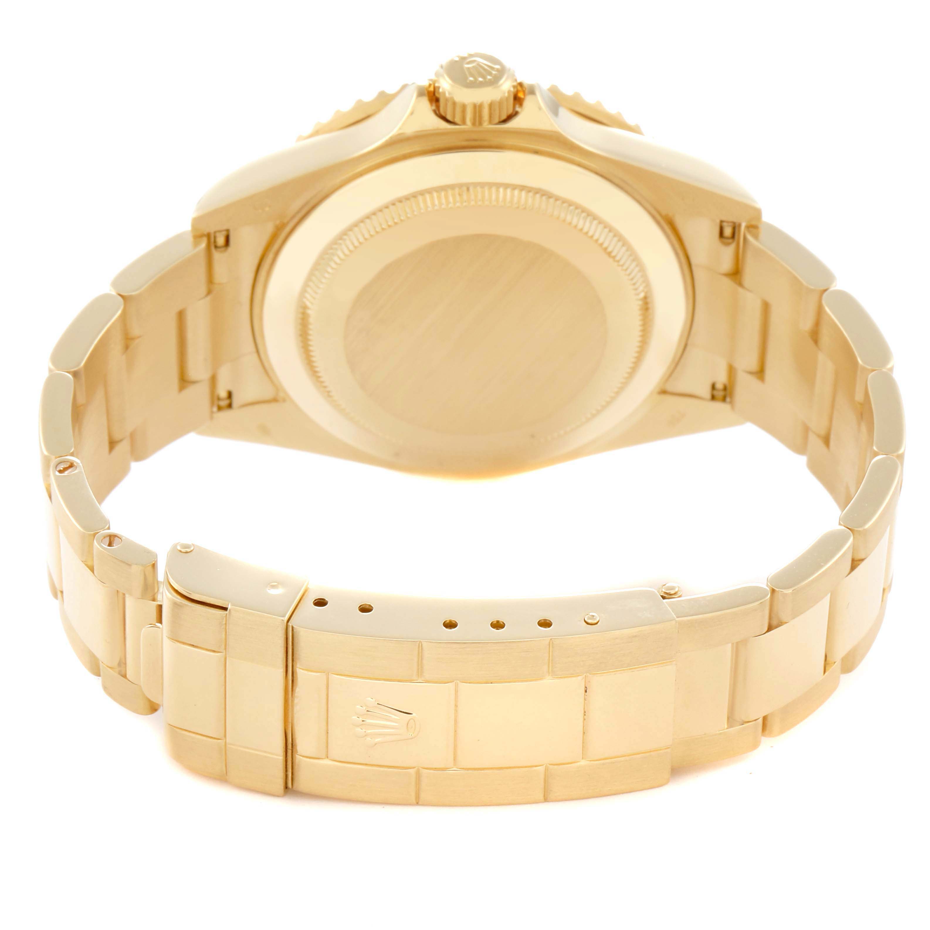 The image shows the back and clasp of a Rolex Submariner 16618 Men's Yellow Gold Blue Dial 16618 Men's Yellow Gold Blue Dial, viewed from a rear angle, highlighting the bracelet and case back.