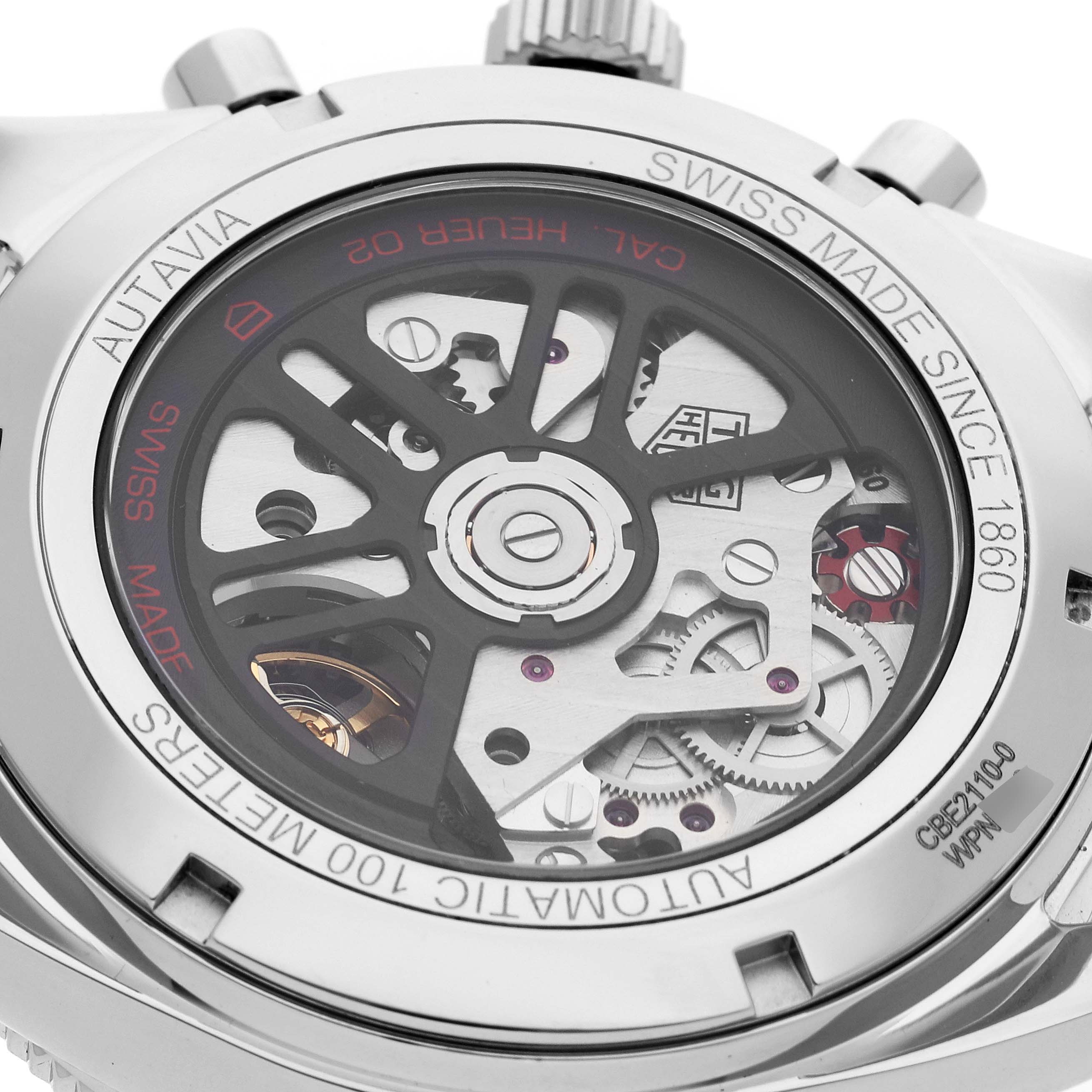 The image shows the back view of a Tag Heuer Autavia CBE2110 Men's Stainless Steel Black Dial CBE2110 Men's Stainless Steel Black Dial watch, highlighting its automatic movement and intricate internal mechanisms.