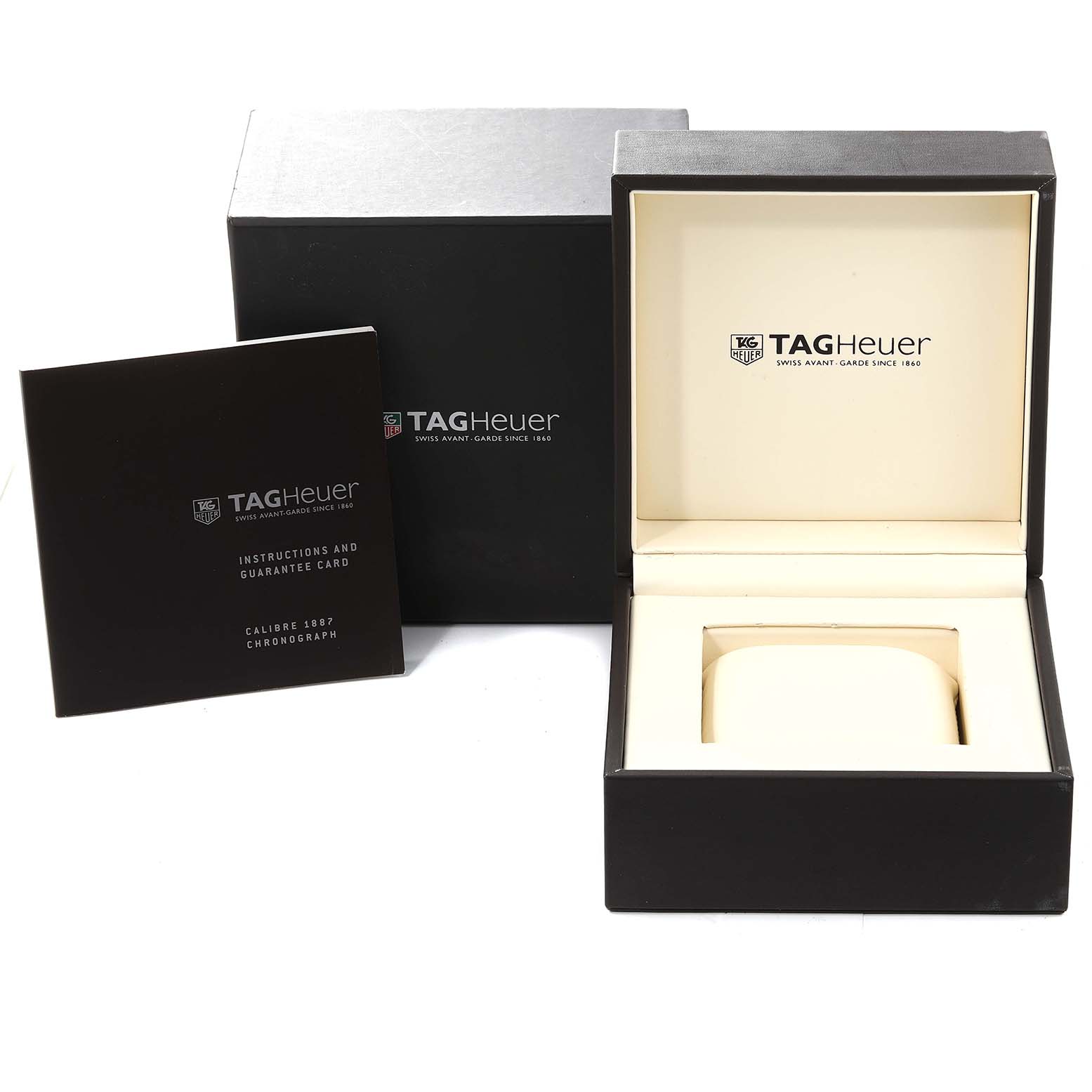 The image shows the Tag Heuer Monza CR2114 Men's Stainless Steel Silver Dial CR2114 Men's Stainless Steel Silver Dial watch box, its cover, and an instruction manual.