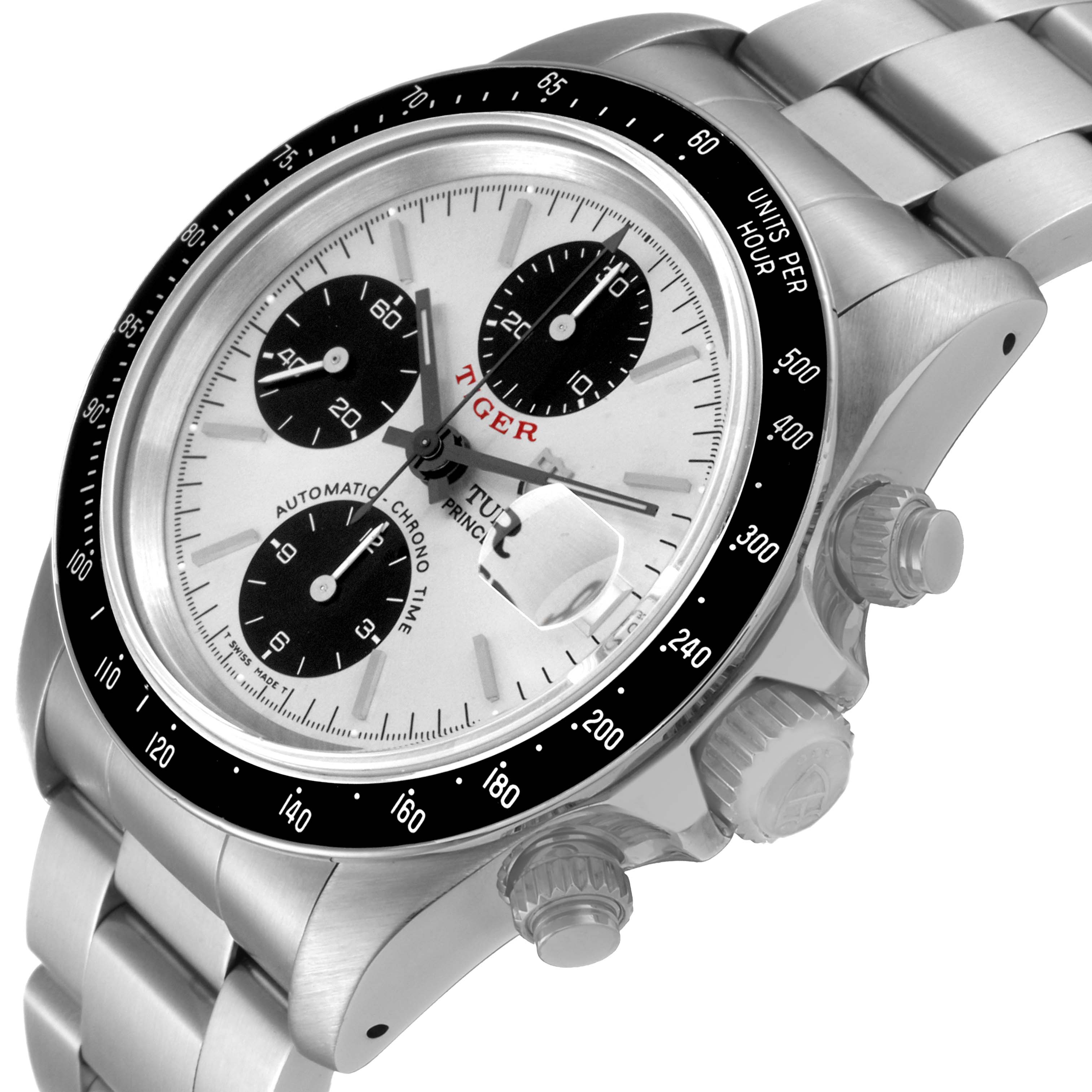 The Tudor Prince model watch is shown at an angle highlighting its face, bezel, chronograph subdials, and bracelet.