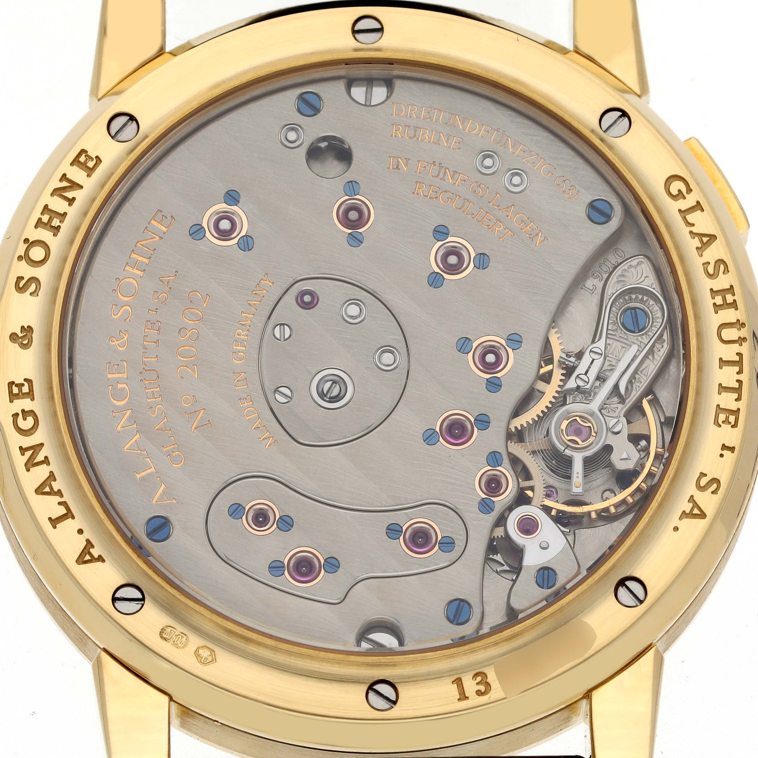 The image shows the case back of the Lange 1 watch by A. Lange & Söhne, revealing its intricate movement.