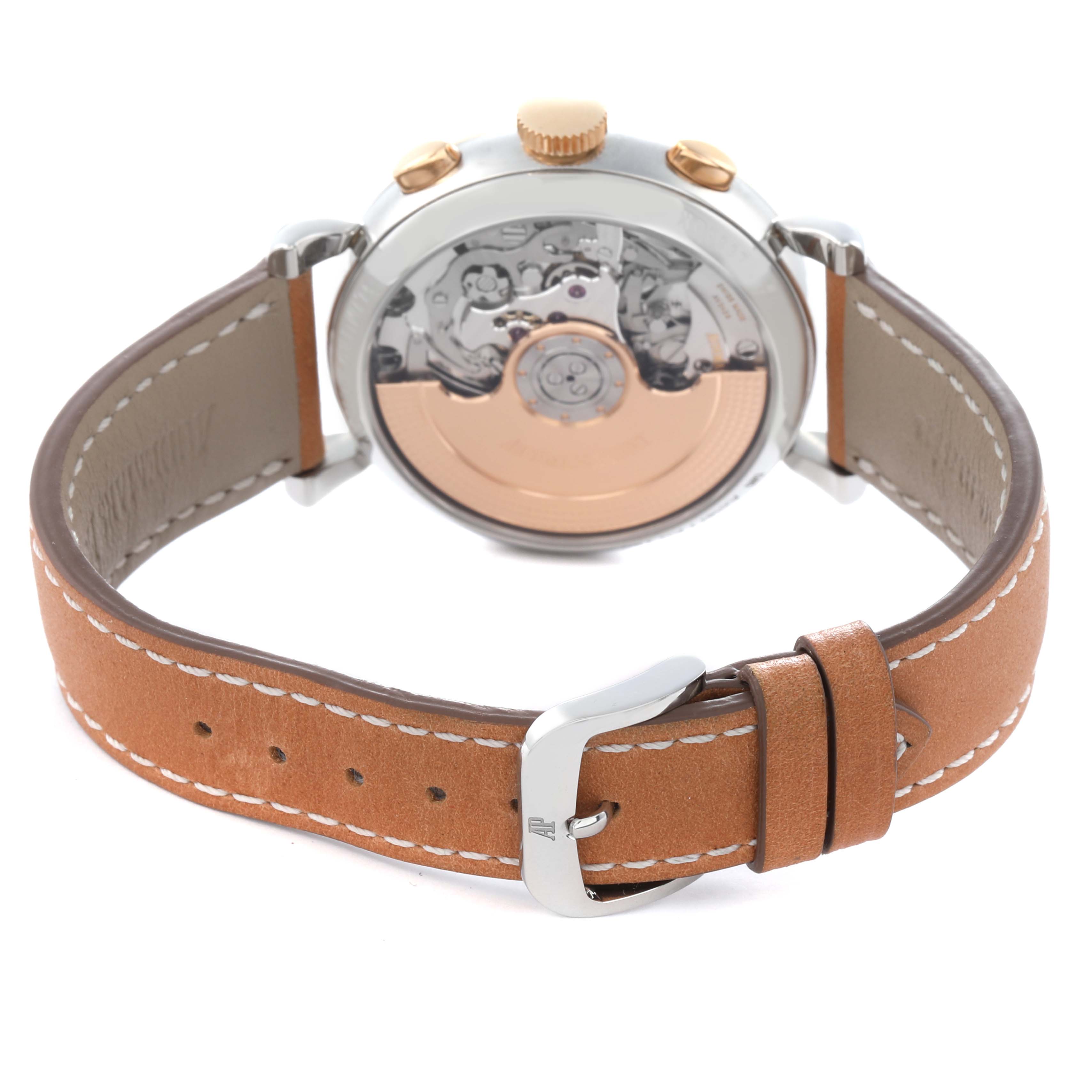 The image shows the back of an Audemars Piguet Remaster, highlighting the movement and leather strap with a buckle.