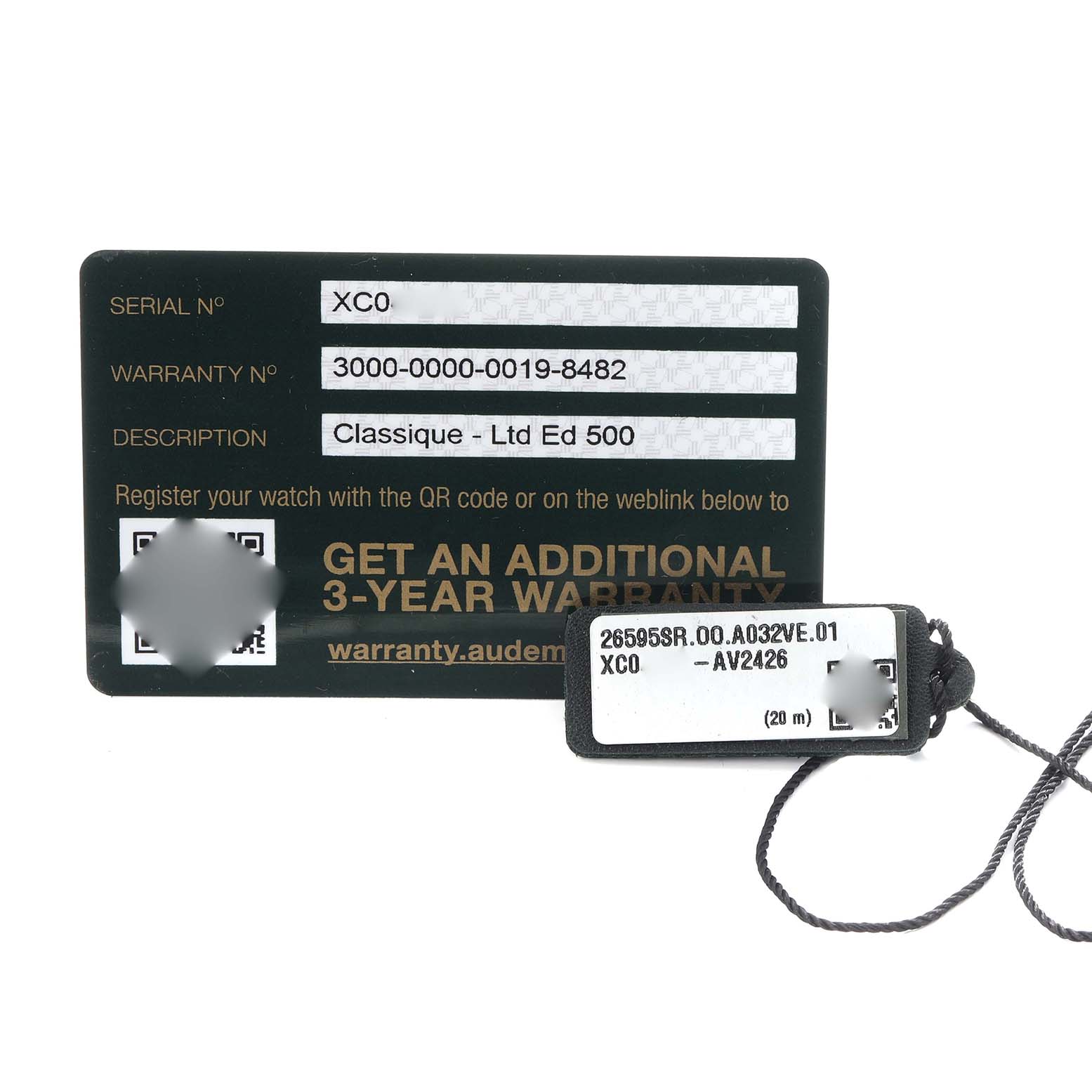 The image shows warranty cards and a tag for the Audemars Piguet Remaster  26595SR.OO.A032VE.01 Men
s Steel and Gold (two tone) Champagne Dial 26595SR.OO.A032VE.01 Men
s Steel and Gold (two tone) Champagne Dialmodel, including serial and warranty numbers.