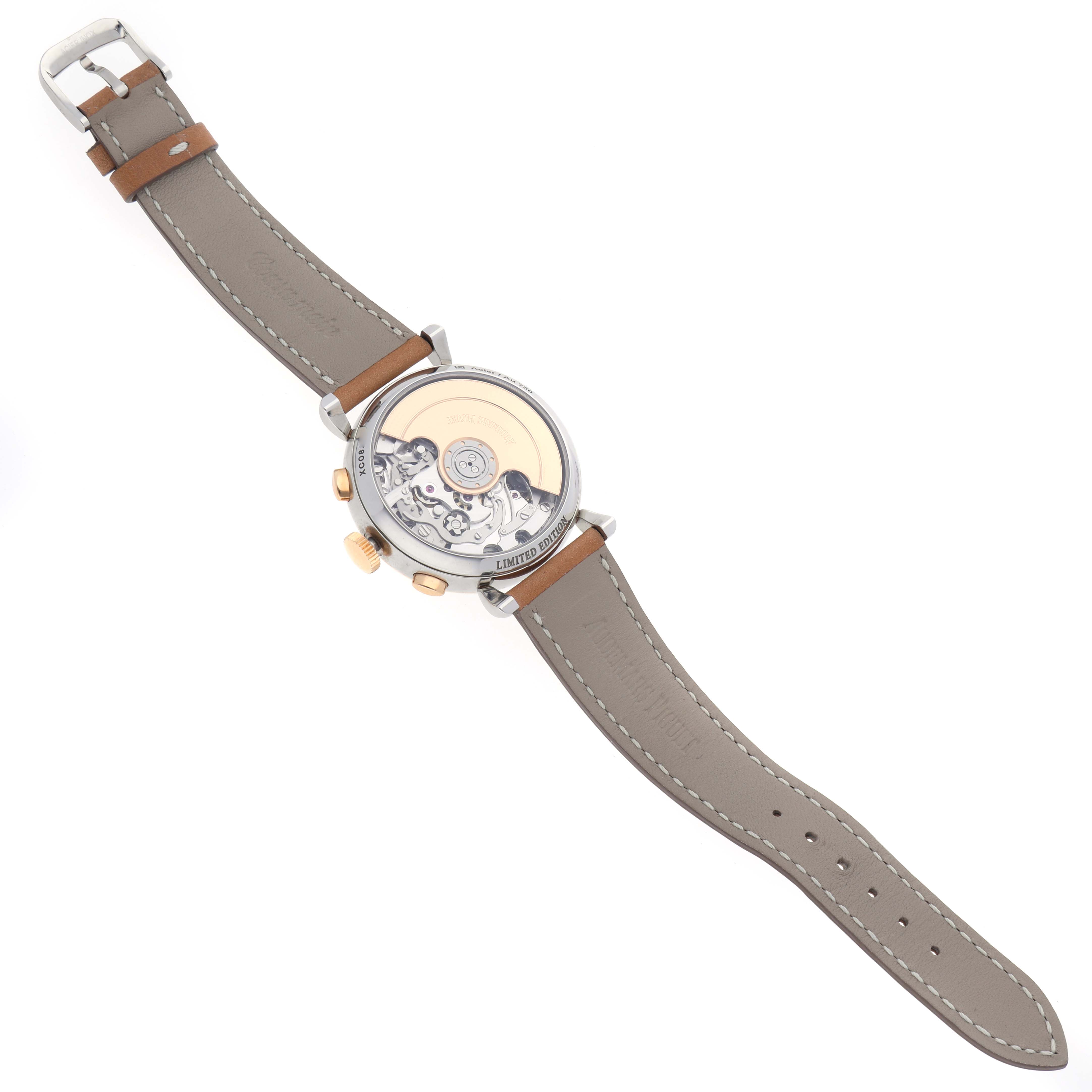 The Audemars Piguet Remaster  26595SR.OO.A032VE.01 Men
s Steel and Gold (two tone) Champagne Dial 26595SR.OO.A032VE.01 Men
s Steel and Gold (two tone) Champagne Dialwatch is shown from the back, displaying its open case back and internal mechanism with the strap laid flat.