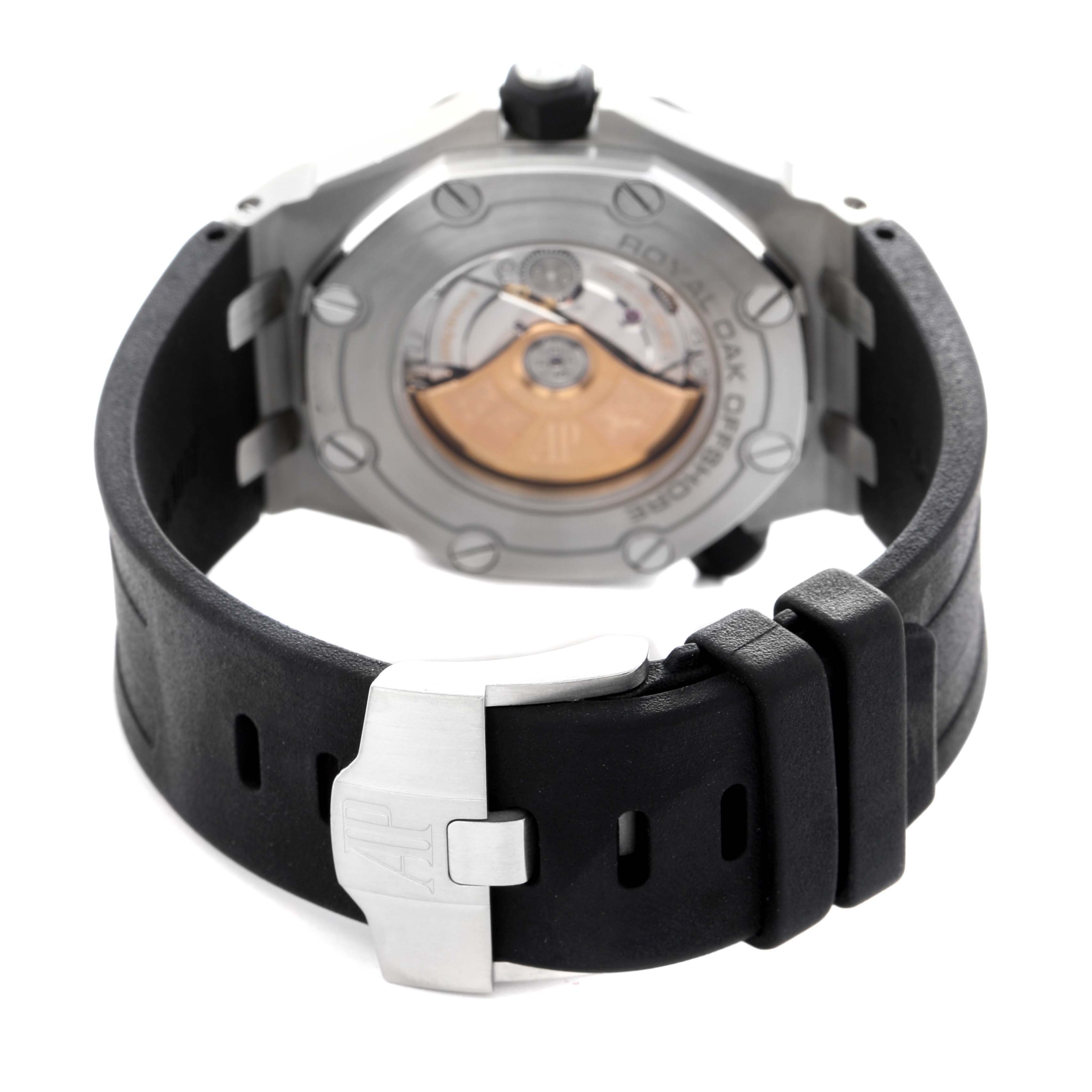 The image shows the back view of a Royal Oak by Audemars Piguet, highlighting its movement and strap clasp.