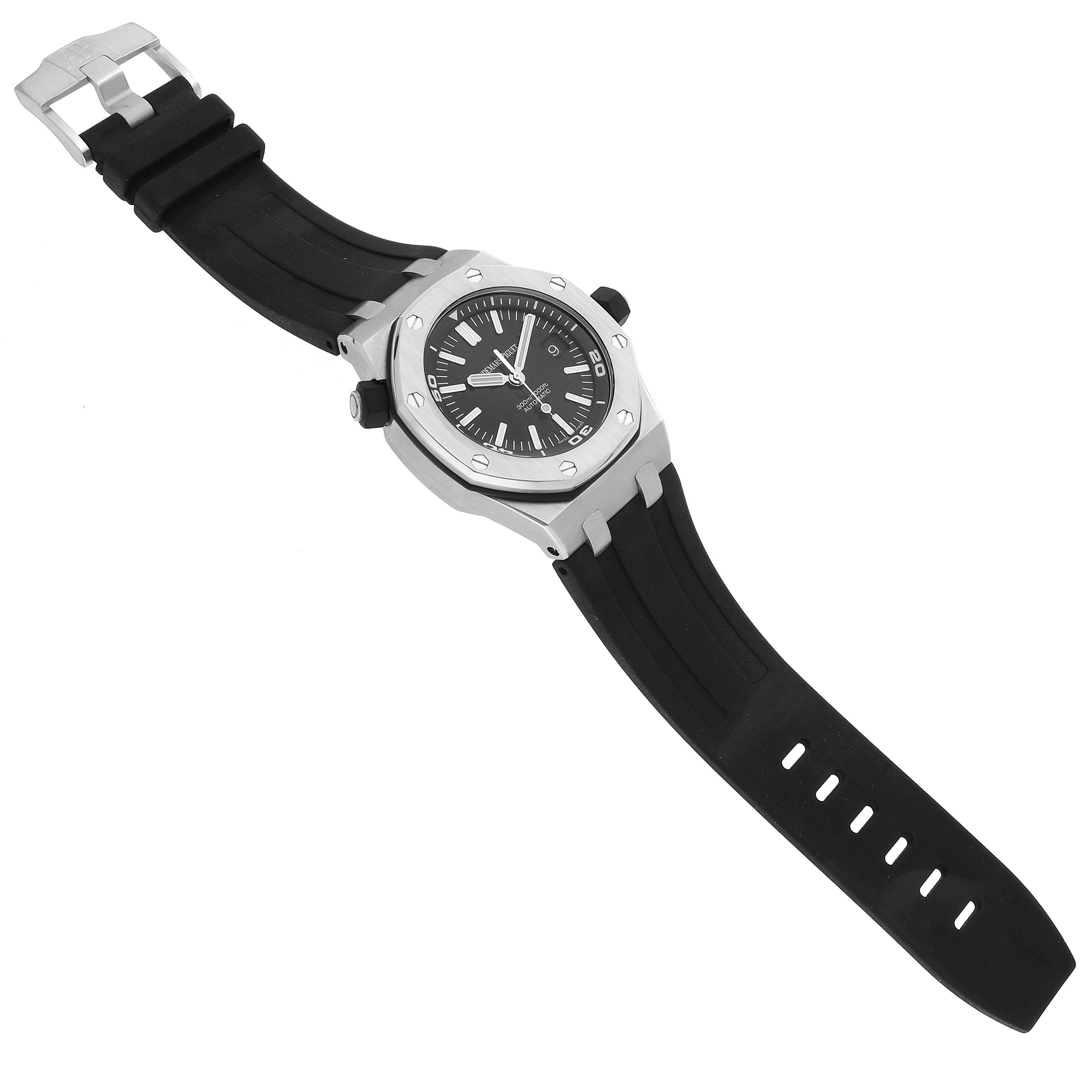 The Royal Oak by Audemars Piguet is shown at a slight angle, featuring the case, bezel, dial, and rubber strap.