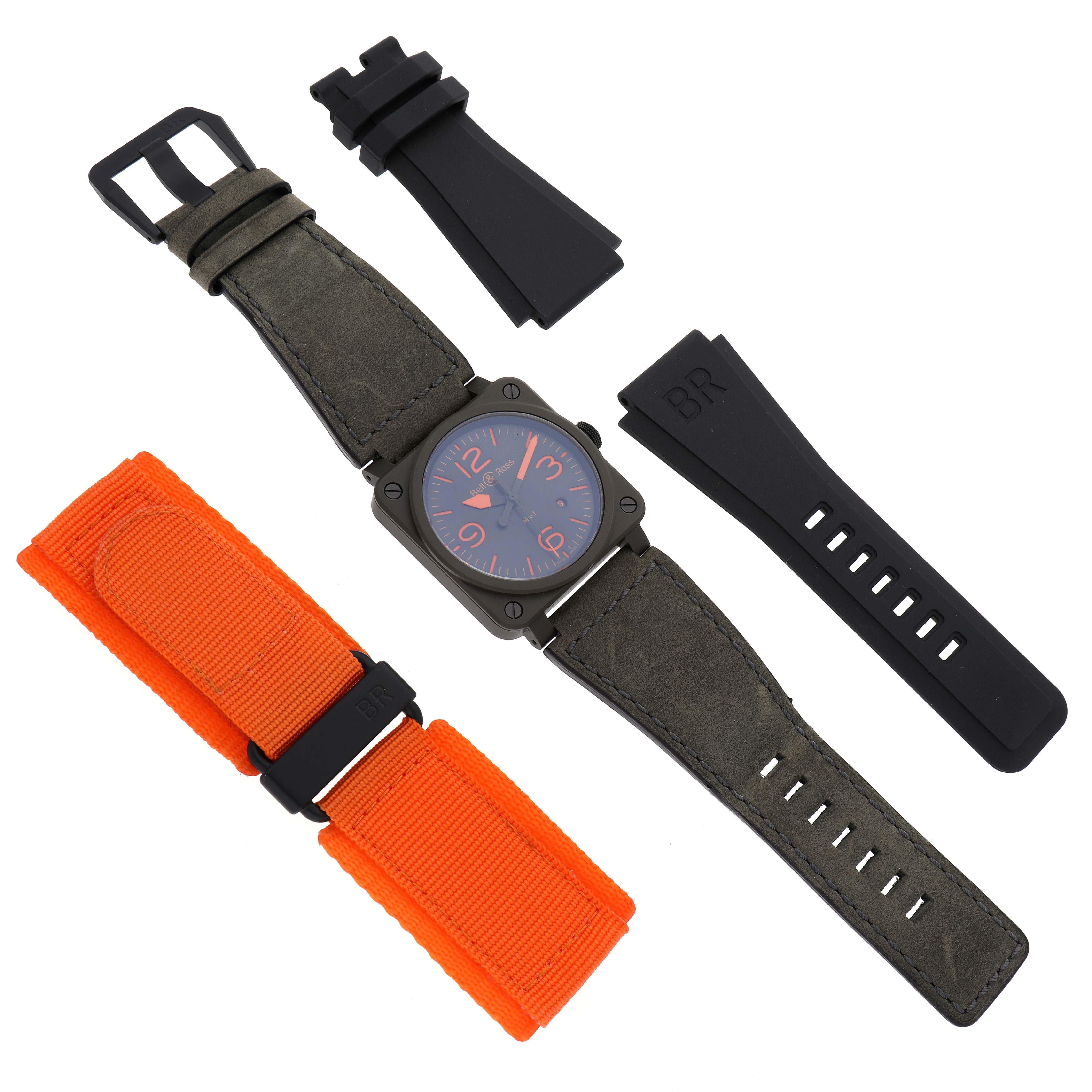 The Bell 
Ross Heritage BR03-92-CKA Men
s Ceramic Brown Dial BR03-92-CKA Men
s Ceramic Brown Dial watch is shown from above with its face, alongside black rubber and orange nylon straps.