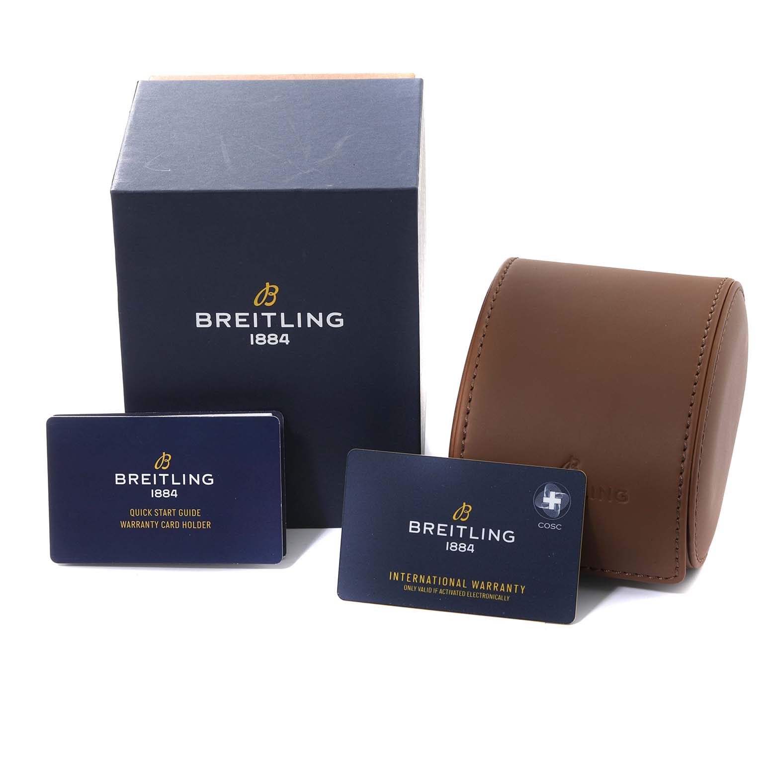 The photo shows the packaging and accessories for the Breitling Chronomat UB0134101C1U1 Men's Steel and Gold (two tone) Blue Dial UB0134101C1U1 Men's Steel and Gold (two tone) Blue Dial model, including a blue box, a brown watch case, and warranty cards.